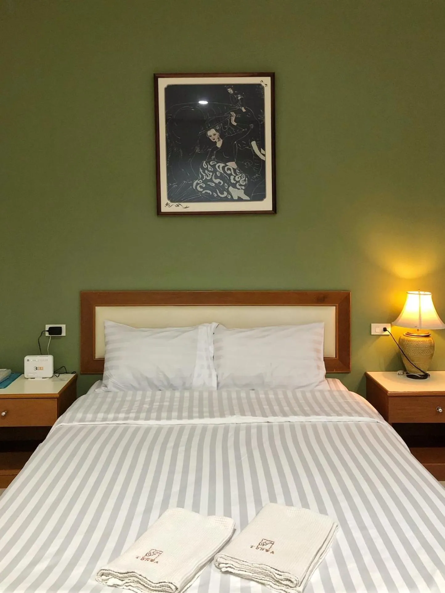 Bed in Tonwa Resort Hotel