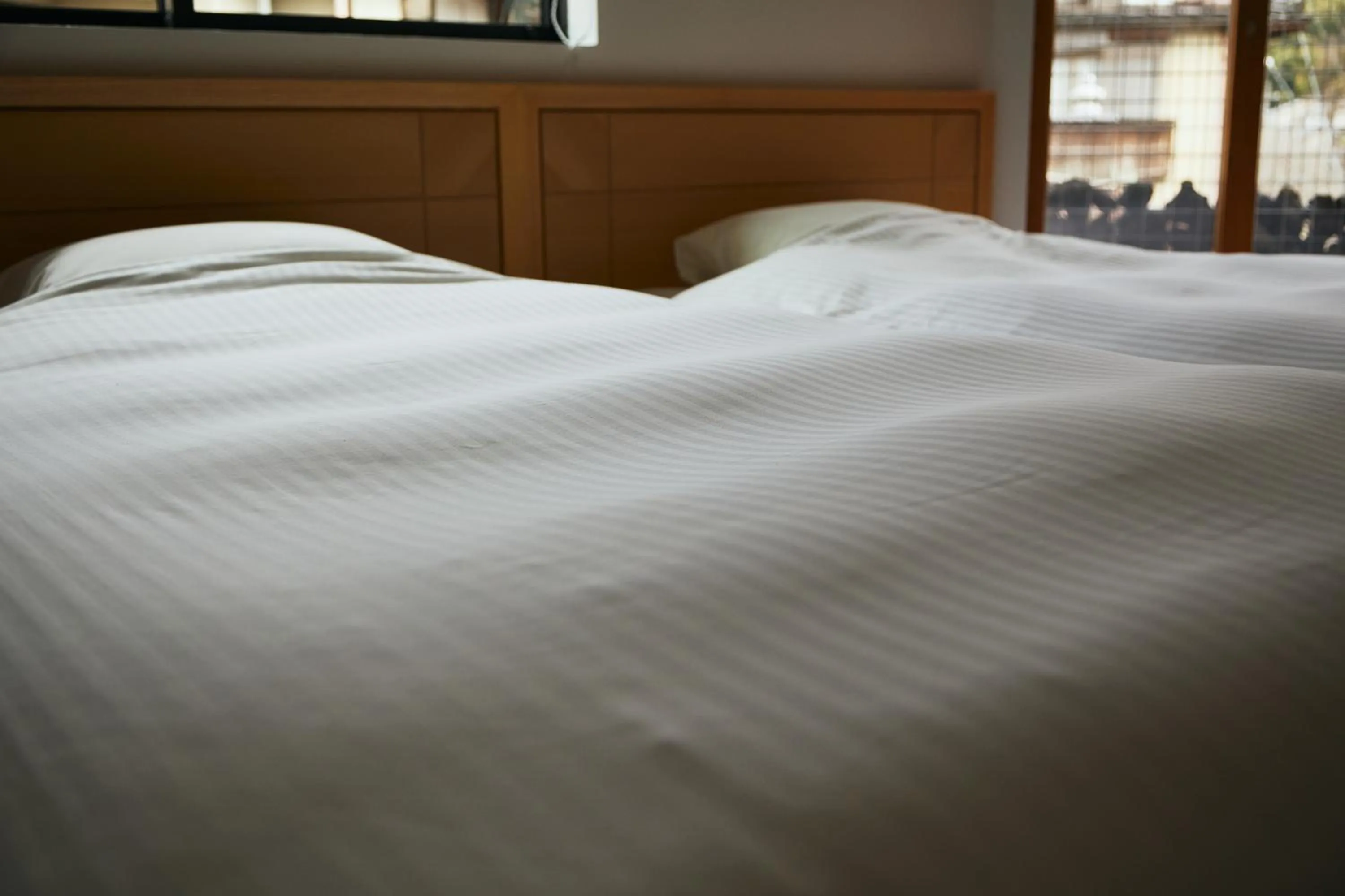 Bed in TSUCHIYA Kinosaki onsen