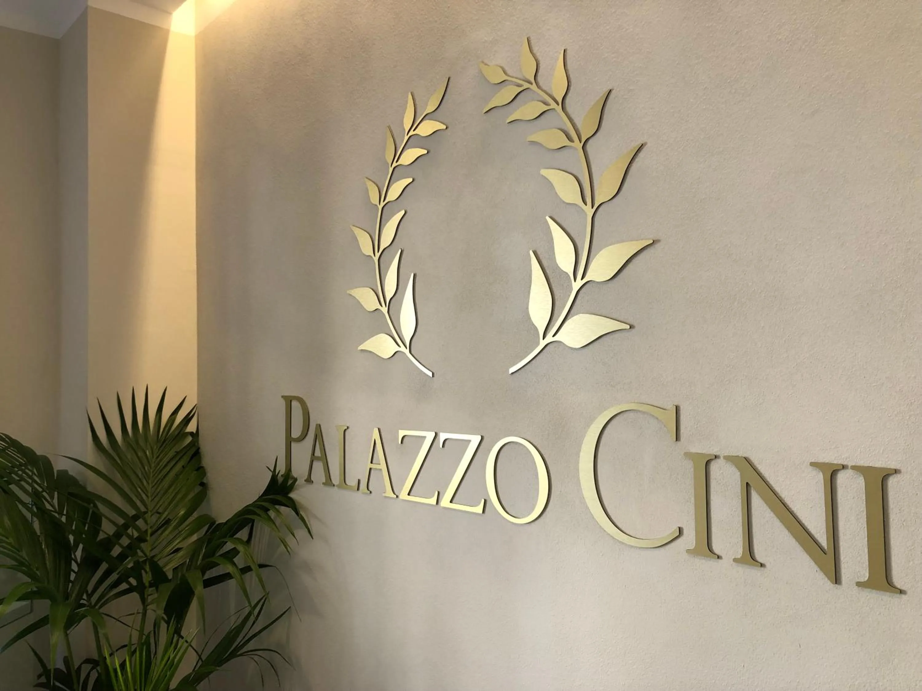 Property logo or sign in Palazzo Cini Luxury Rooms in Pisa