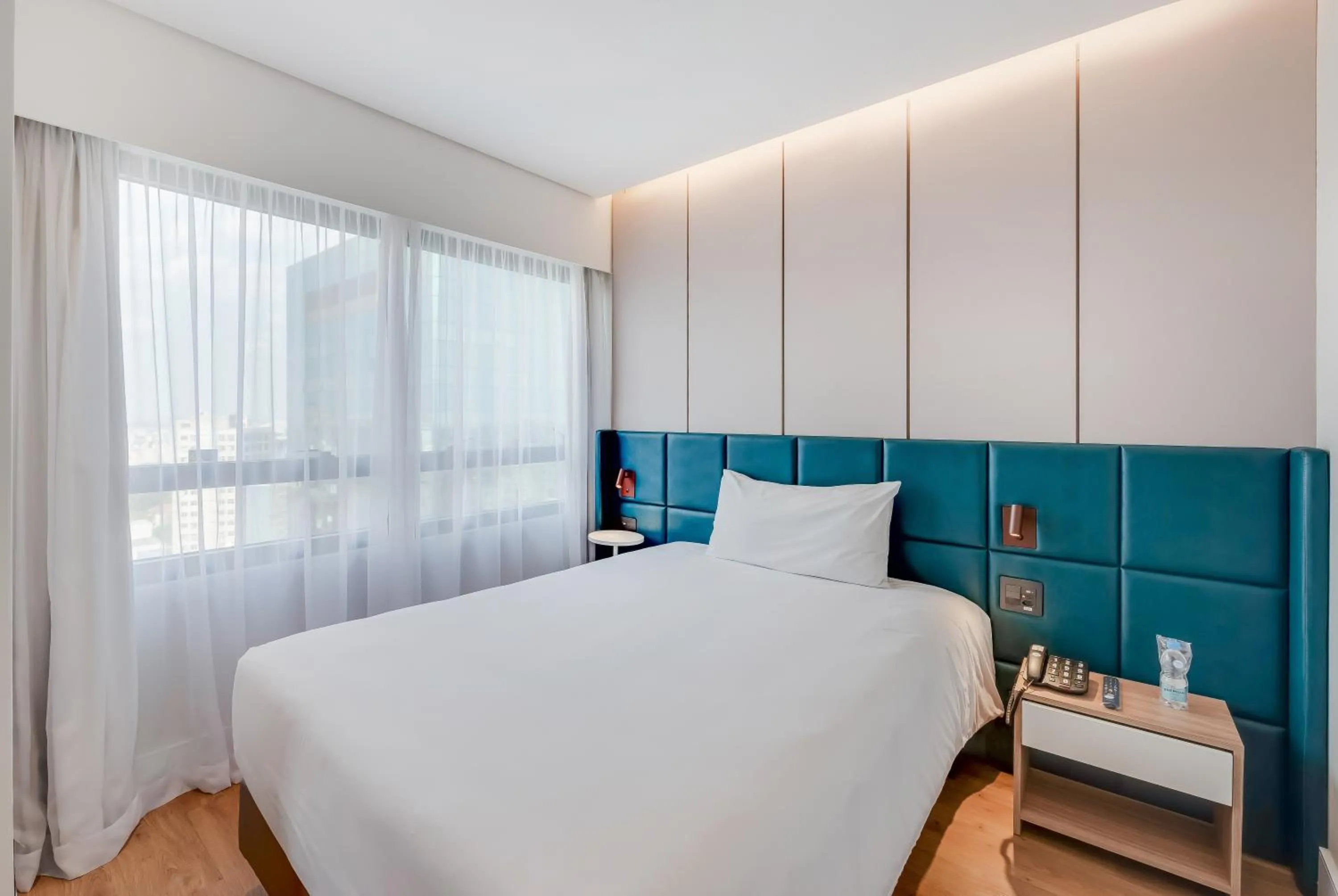 Bed in Radisson São Paulo Paulista