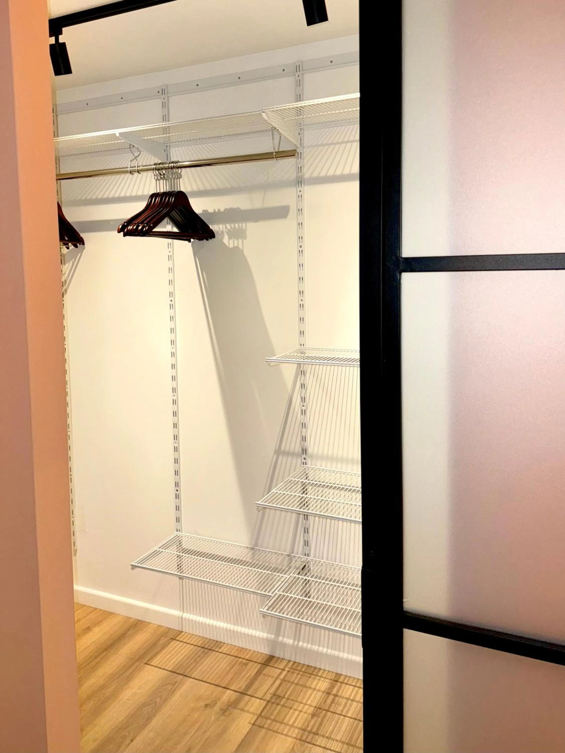 wardrobe in Home & Travel Apartments - AC - Parking - City Centre - Manufaktura - OFF Piotrkowska - EC1 - ATLAS Arena - Orientarium - Monopolis