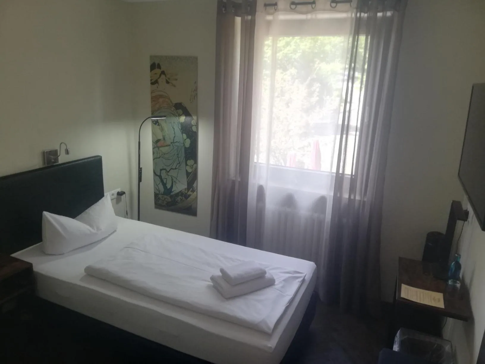 Photo of the whole room, Bed in Das Bergschlösschen