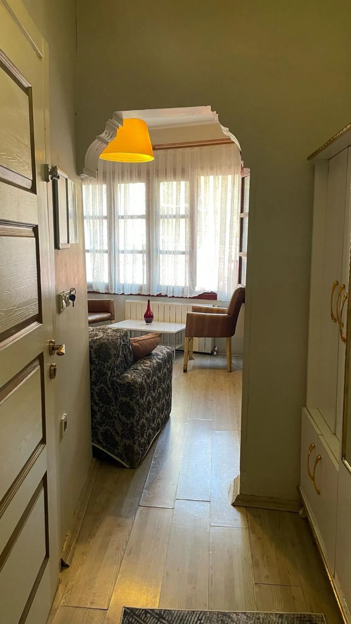 Seating area, Bed in Chez Bore