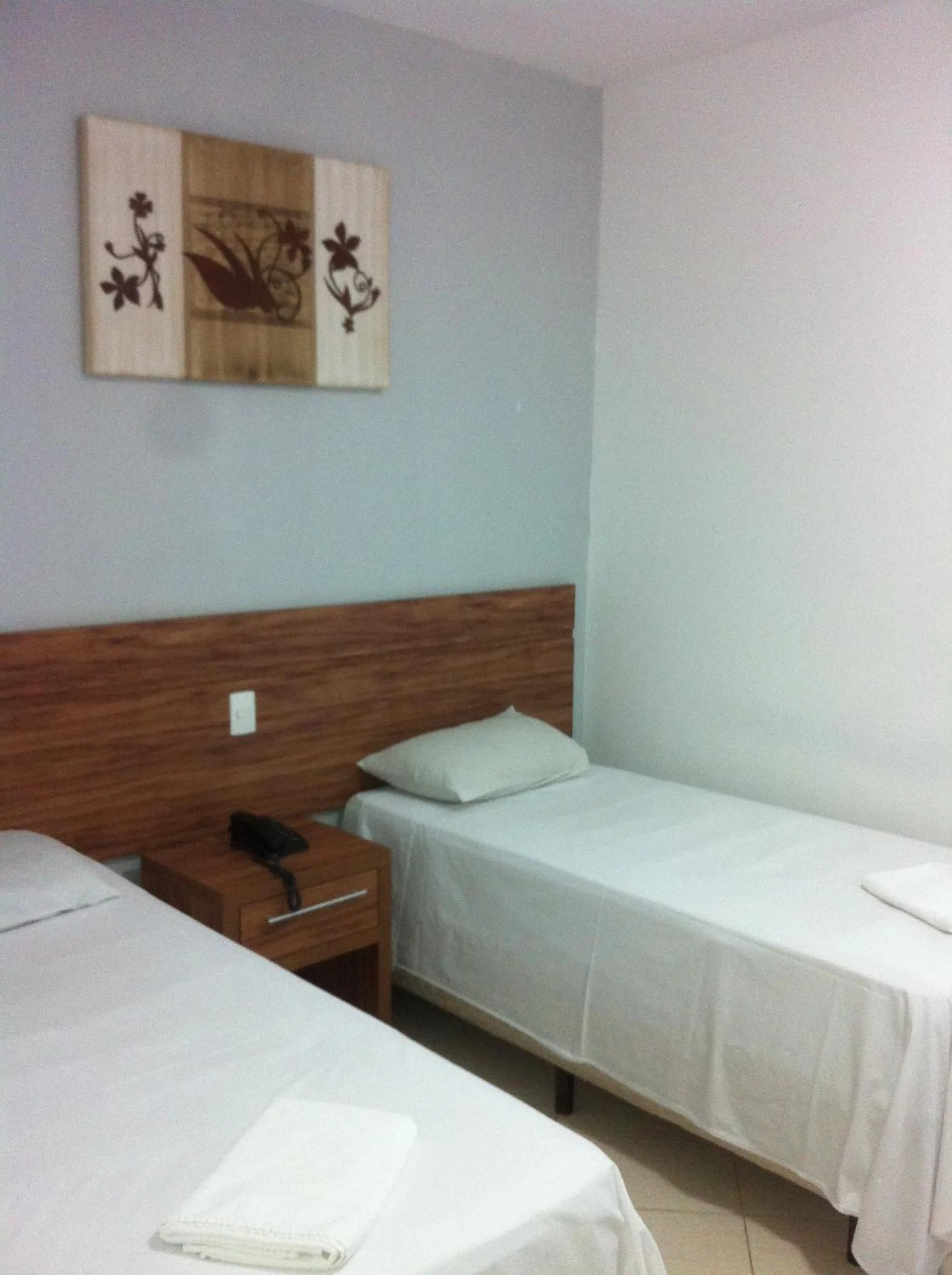 Bed in Hotel Casablanca Suites