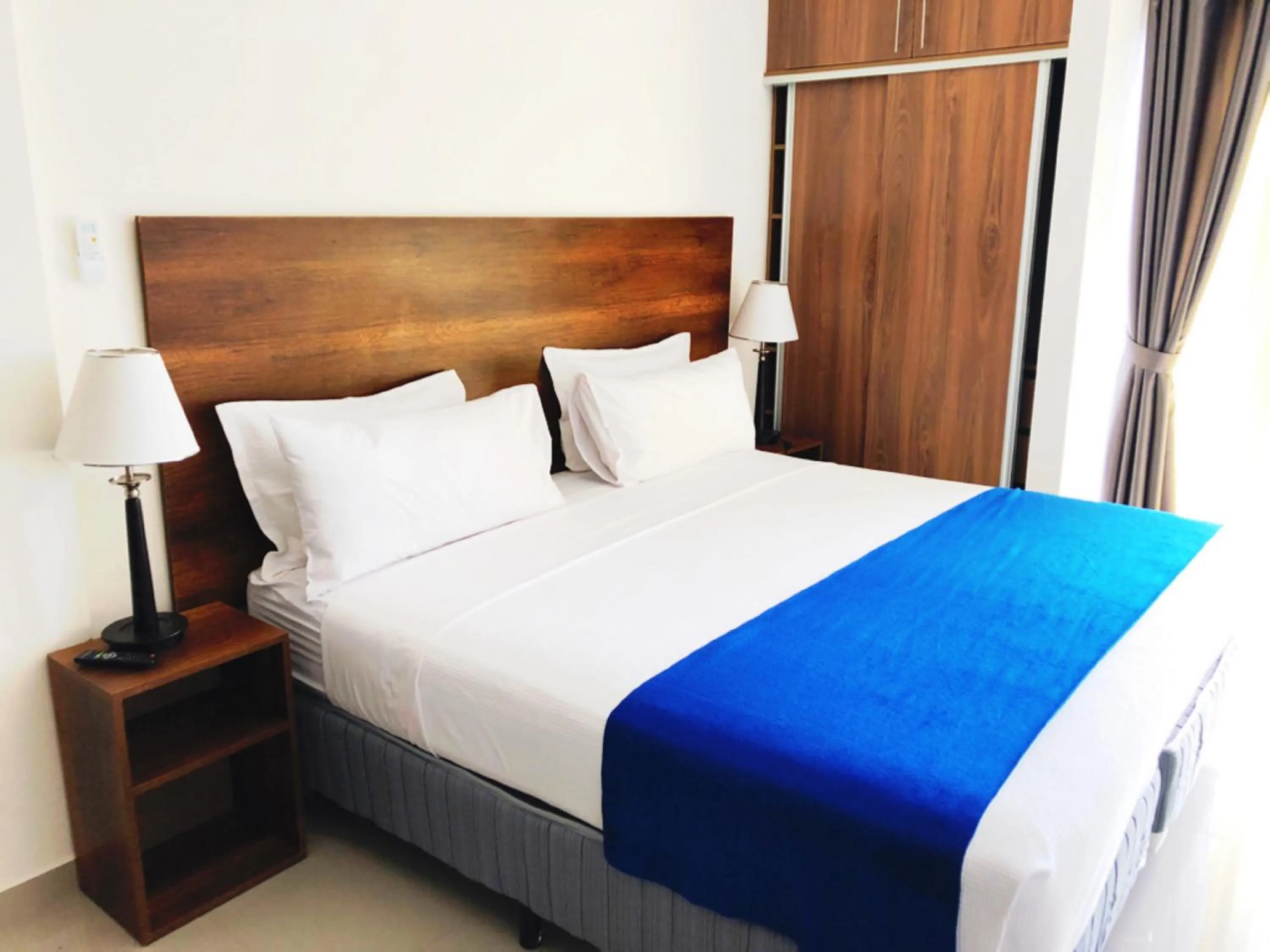 Bed in Pacifico Apart Hotel