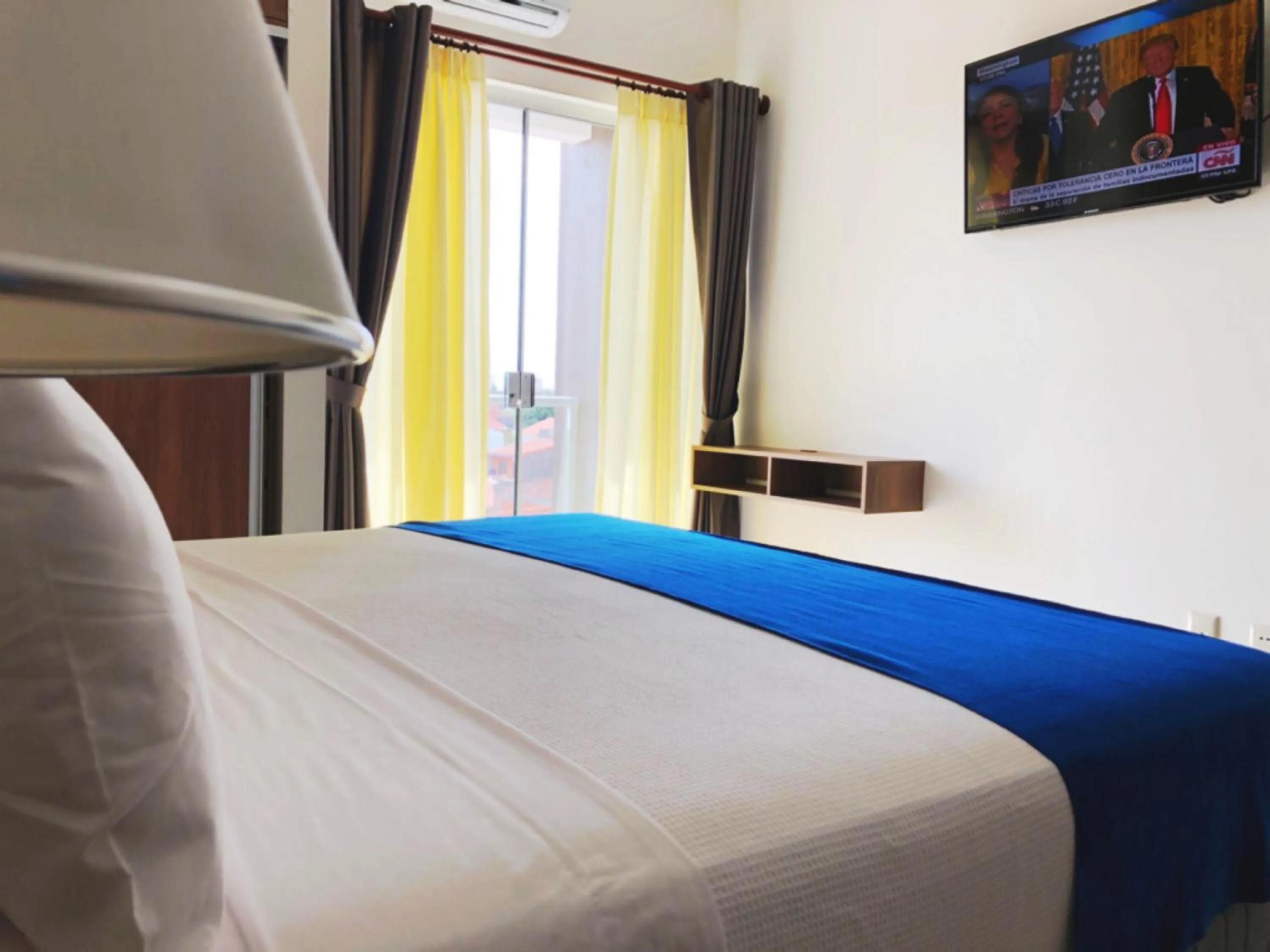Bed in Pacifico Apart Hotel