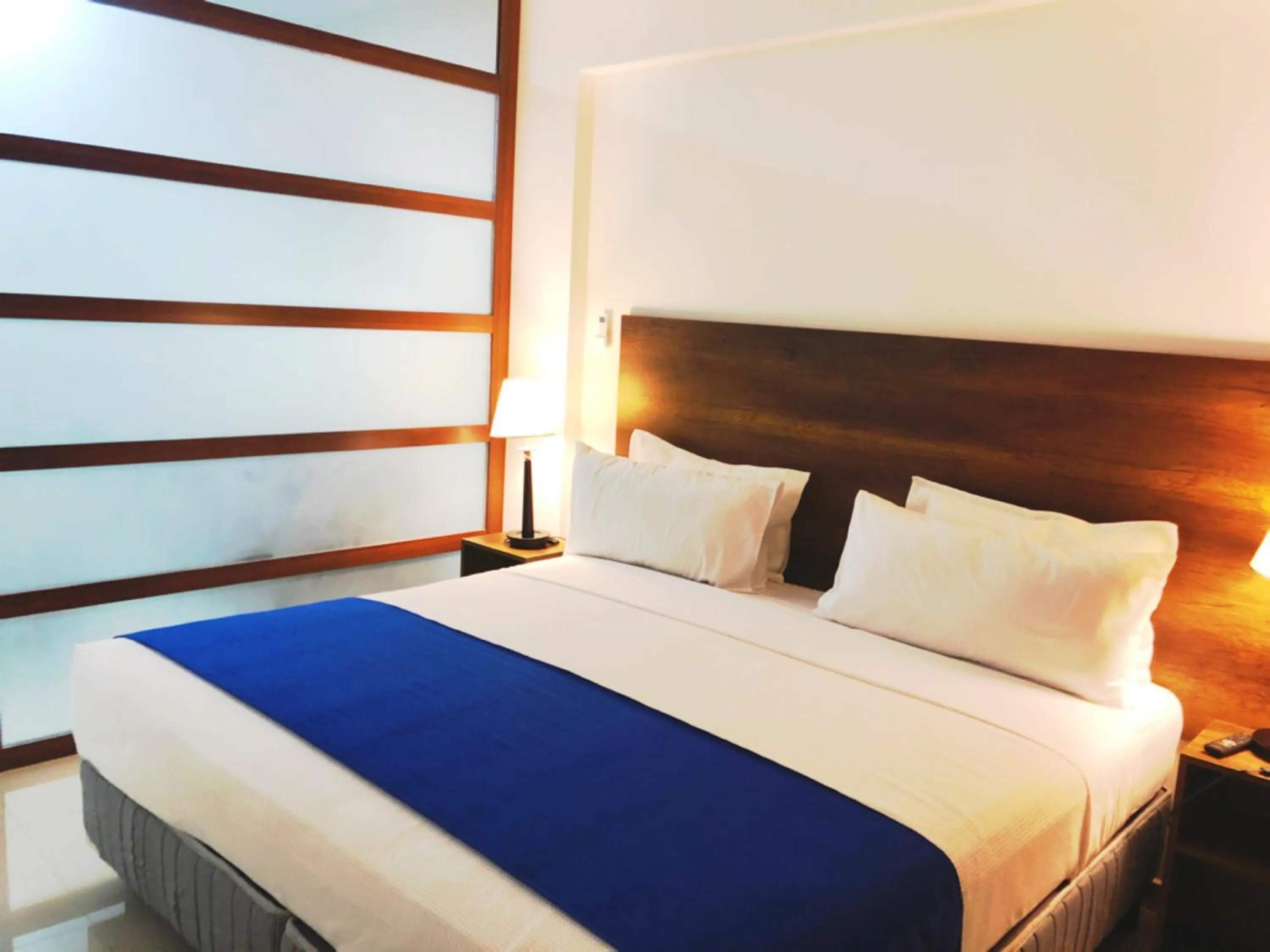 Bed in Pacifico Apart Hotel
