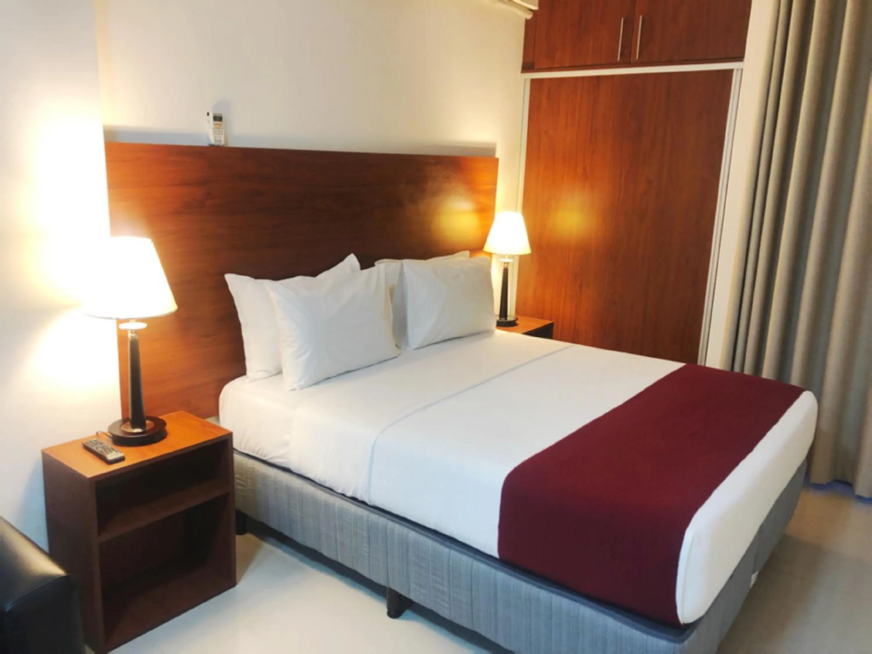 Bed in Pacifico Apart Hotel
