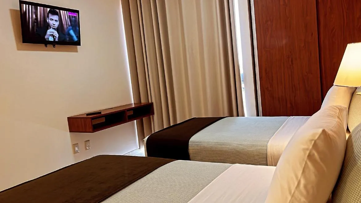 Bed in Pacifico Apart Hotel