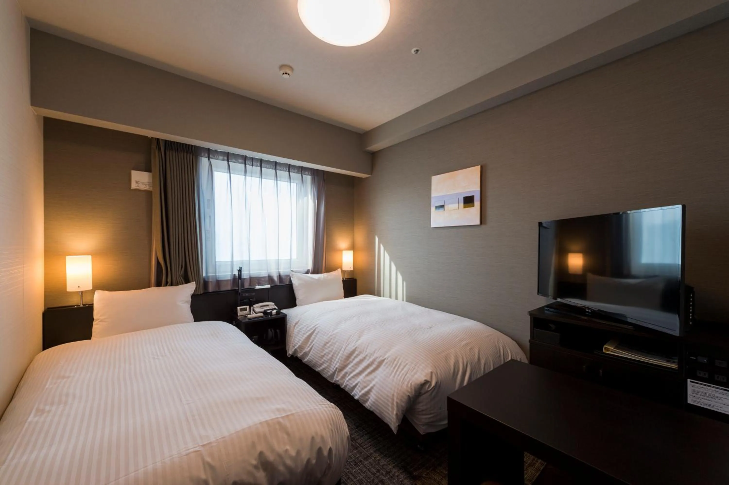 Bed in Hotel Route-Inn Grand Tokyo Asakusabashi