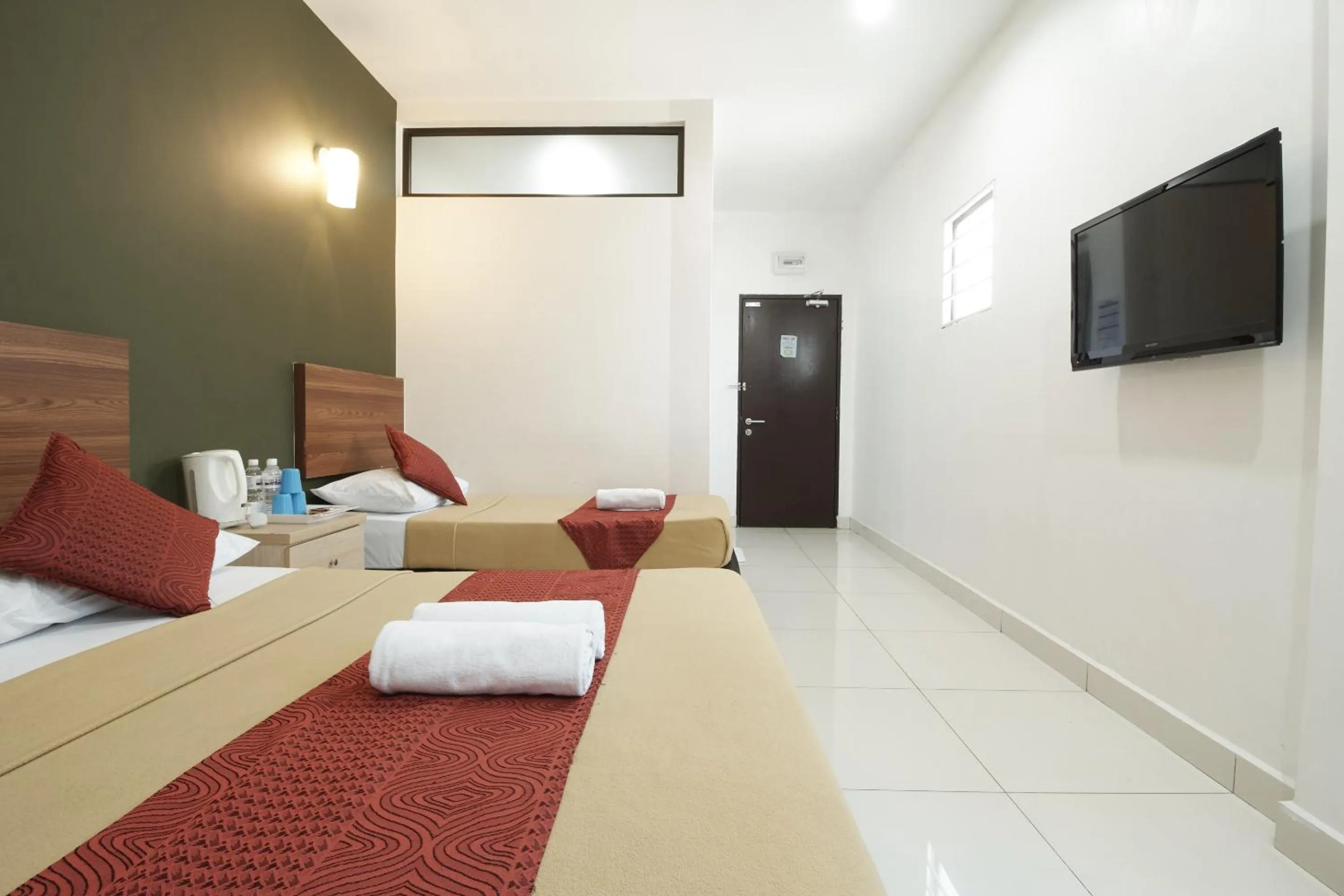 Photo of the whole room, Bed in COOP HOTEL PUTRAJAYA & CYBERJAYA