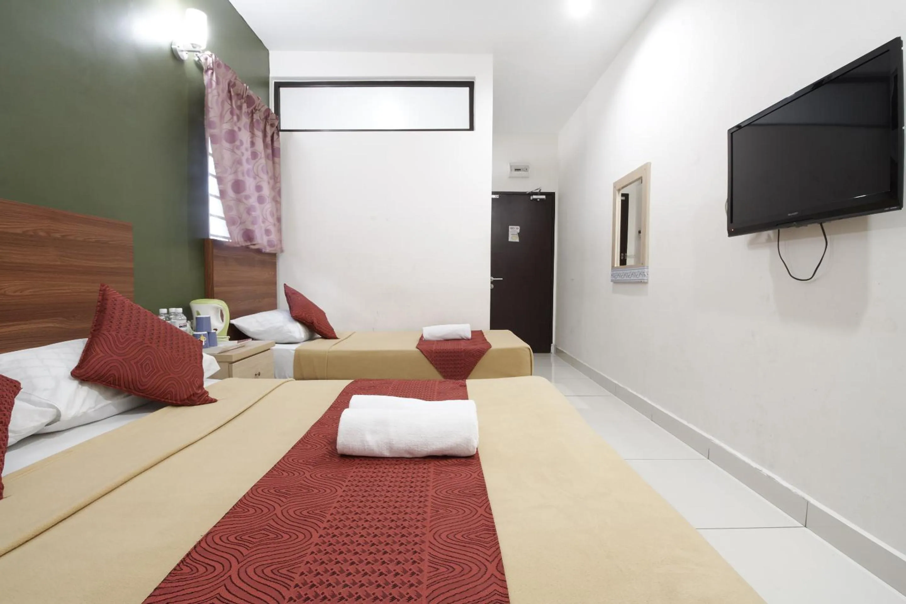Photo of the whole room, Bed in COOP HOTEL PUTRAJAYA & CYBERJAYA