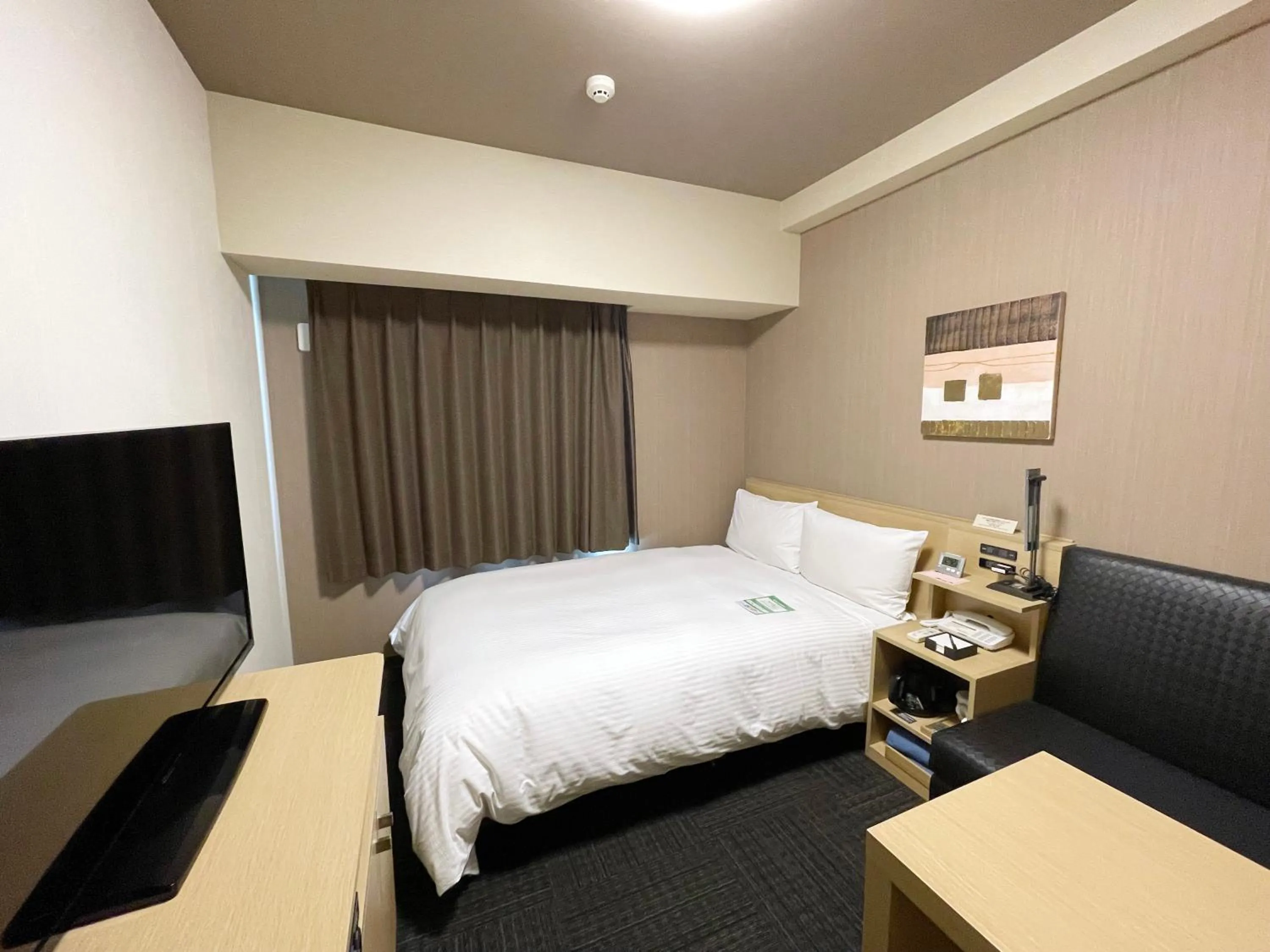 Photo of the whole room, Bed in HOTEL ROUTE-INN Osaka Takaishi -Hagoromo Ekimae-