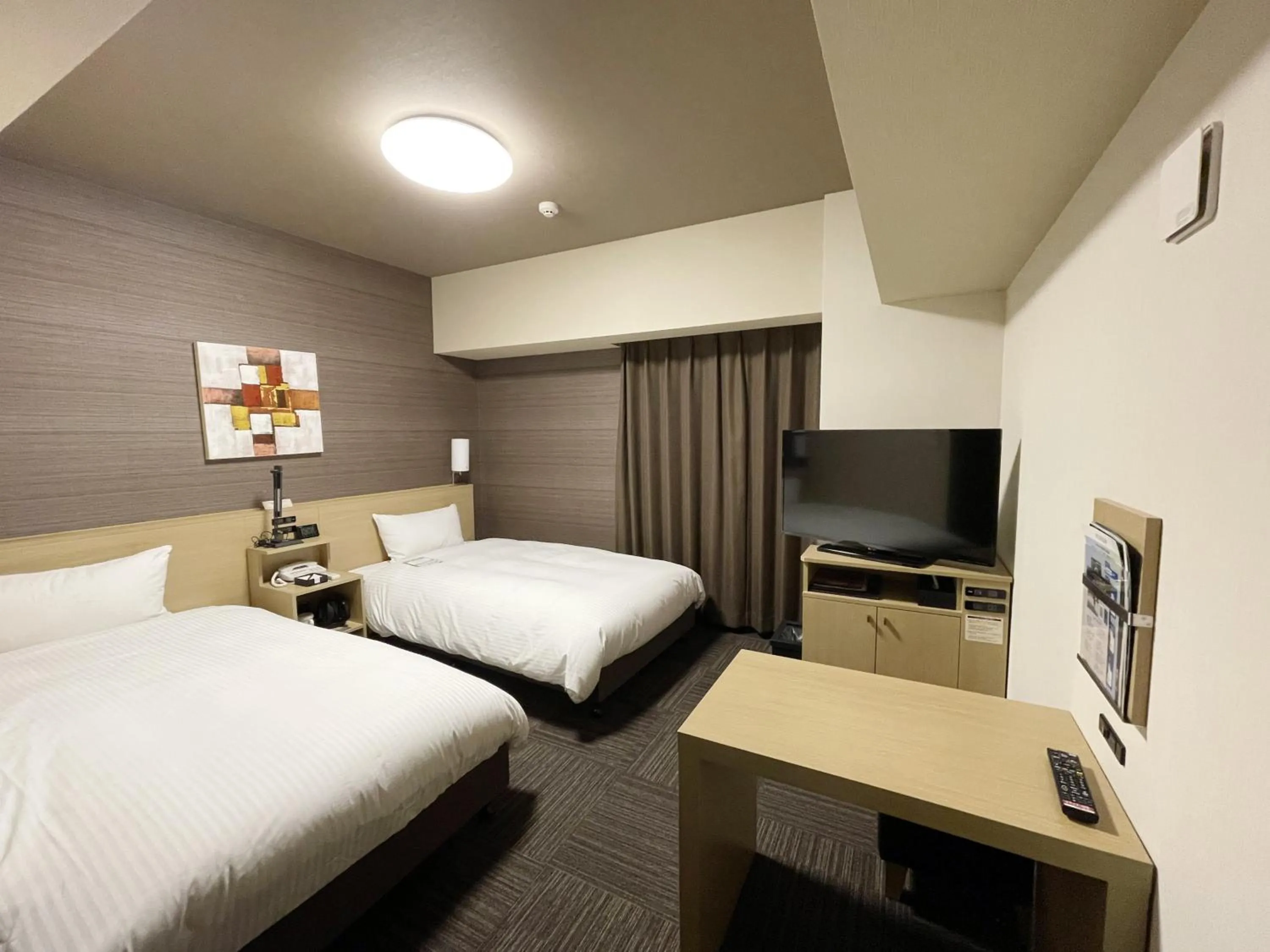 Photo of the whole room, Bed in HOTEL ROUTE-INN Osaka Takaishi -Hagoromo Ekimae-