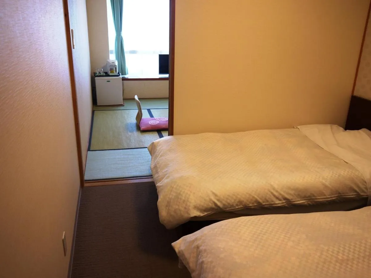 Bed in Itoen Hotel Toi