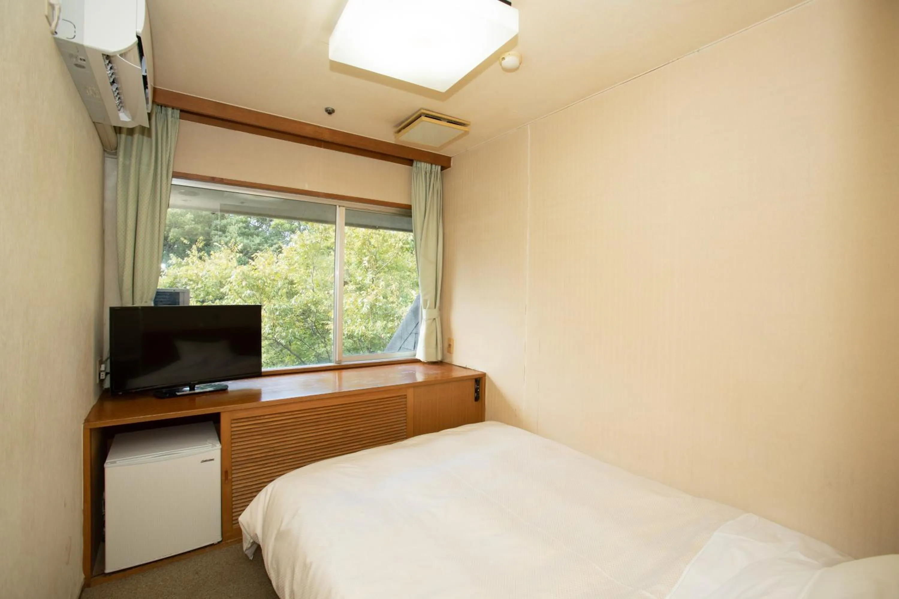 Bed in Itoen Hotel Toi