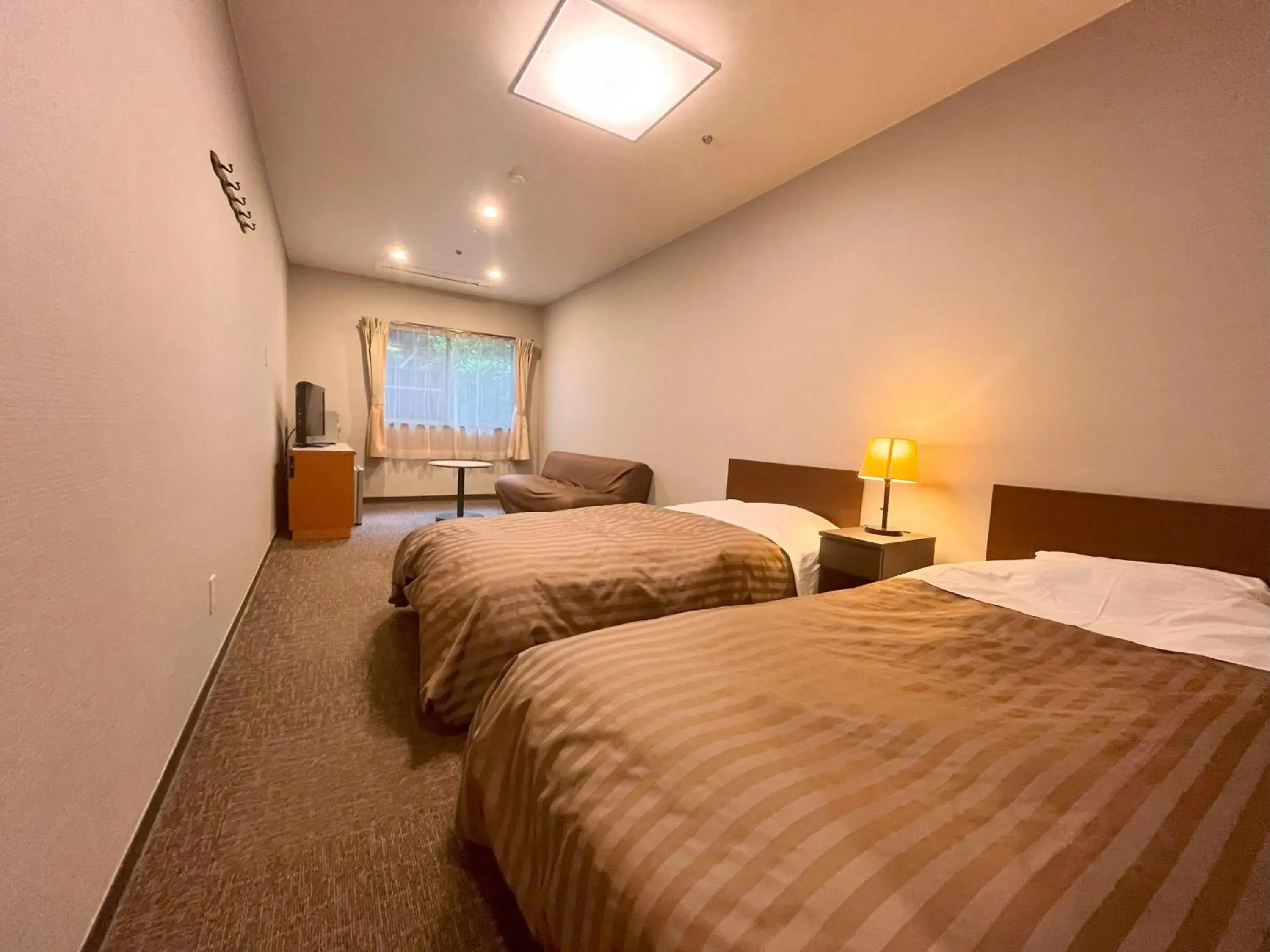 Economy Twin Room - single occupancy in Itoen Hotel Toi Economy Twin Room - single occupancy in Itoen Hotel Toi