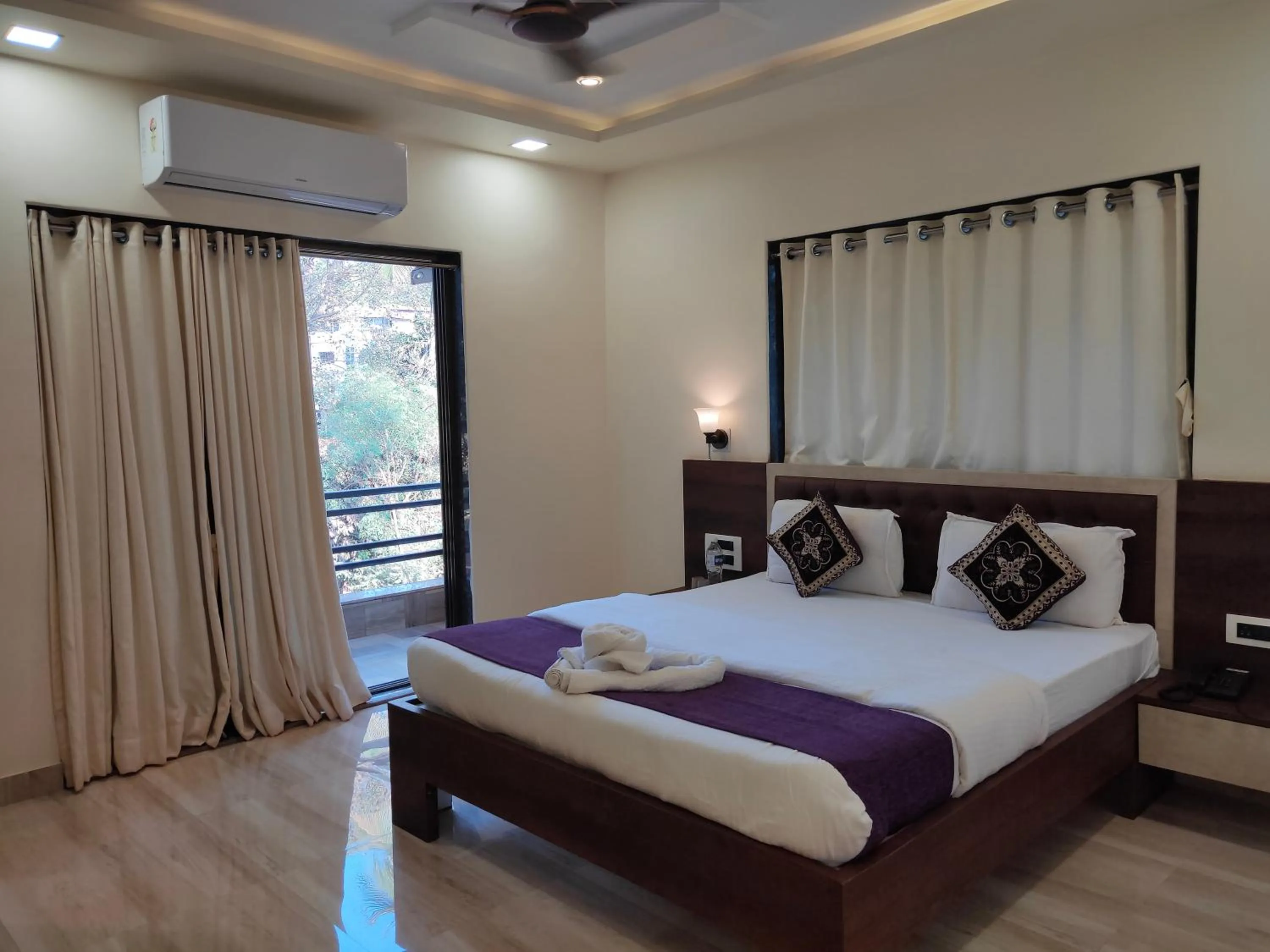 Bed in Hotel Grand Ganesha