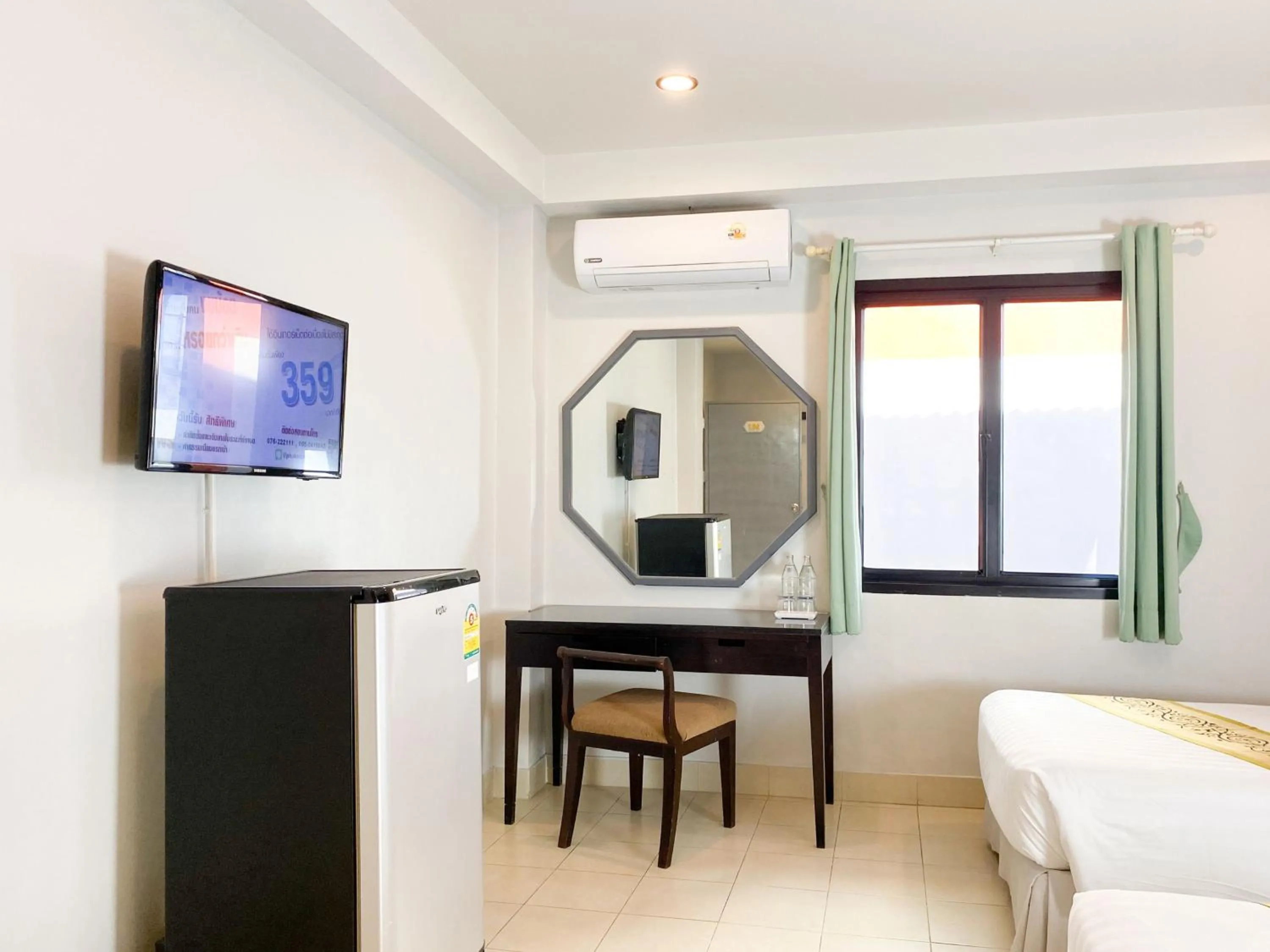 Photo of the whole room, Bed in The Corner