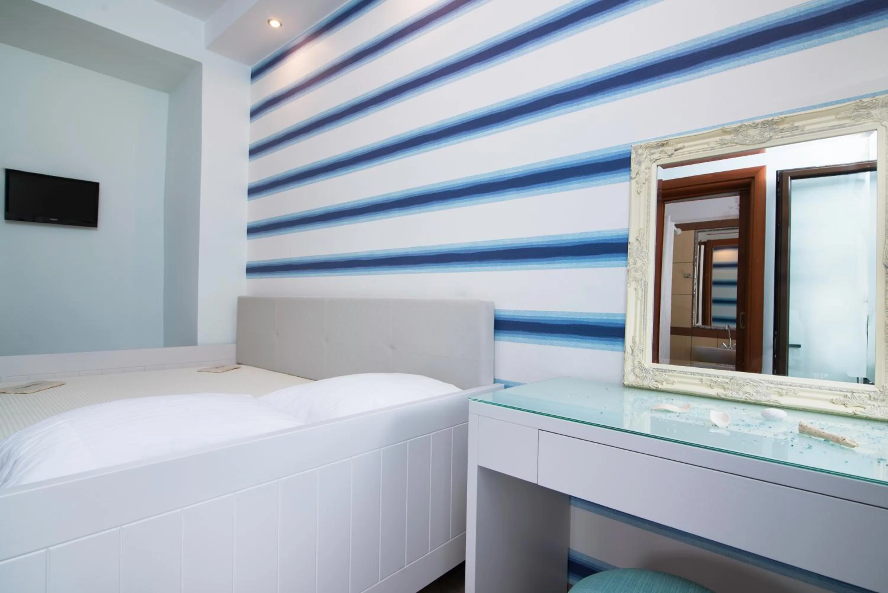 Bed in Kamelia & Semeli Hotel