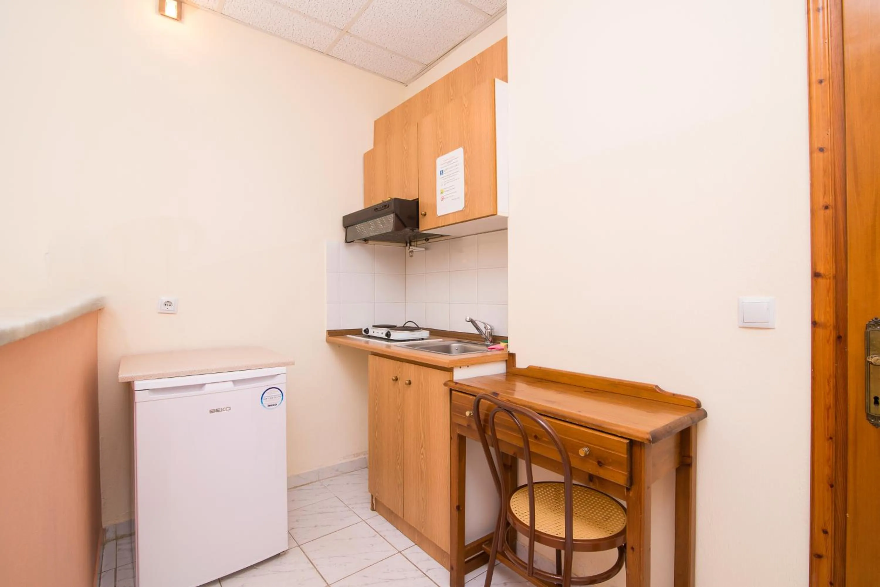 Kitchen or kitchenette in Kamelia & Semeli Hotel