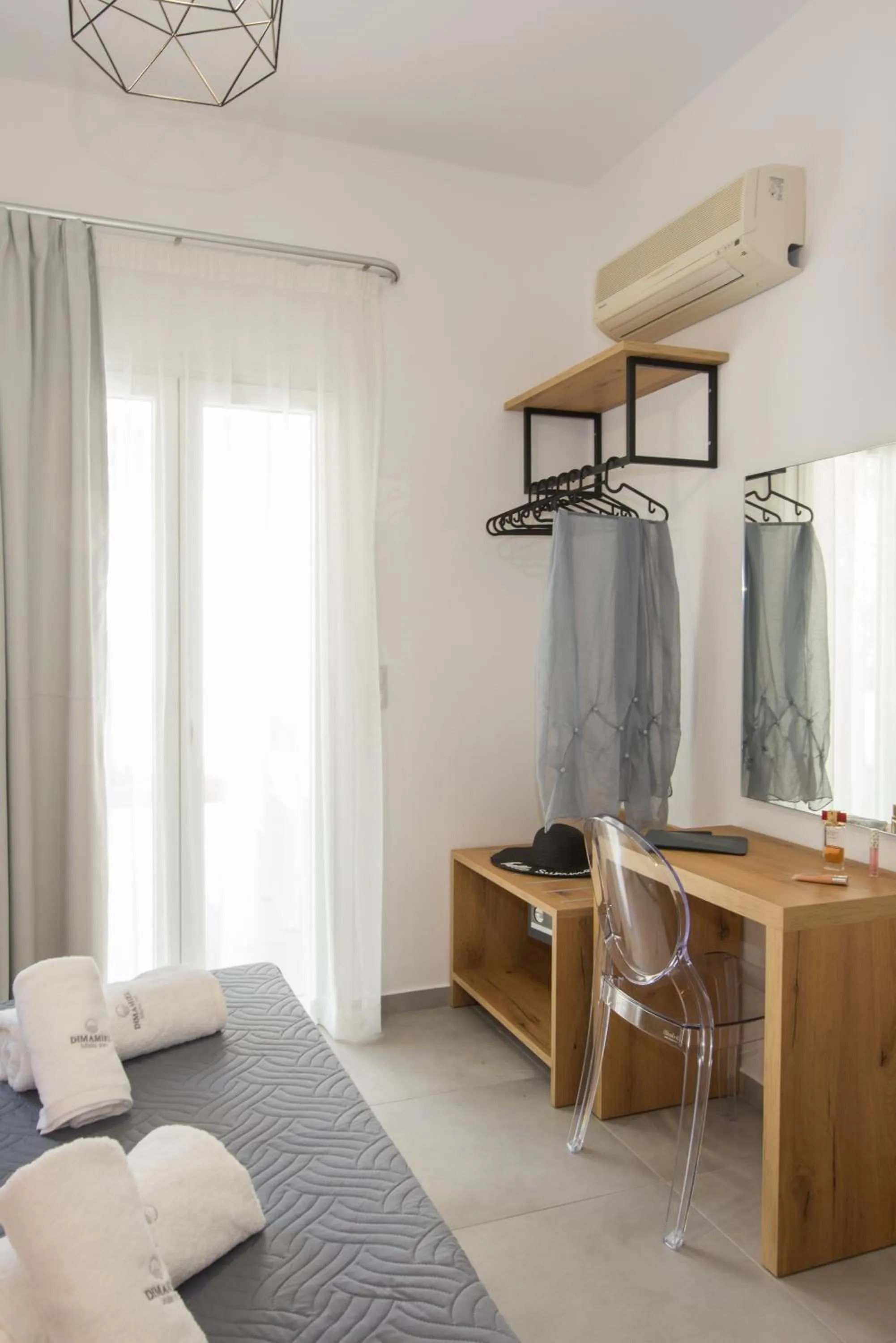 Seating area, Bed in Dimamiel Malia Inn