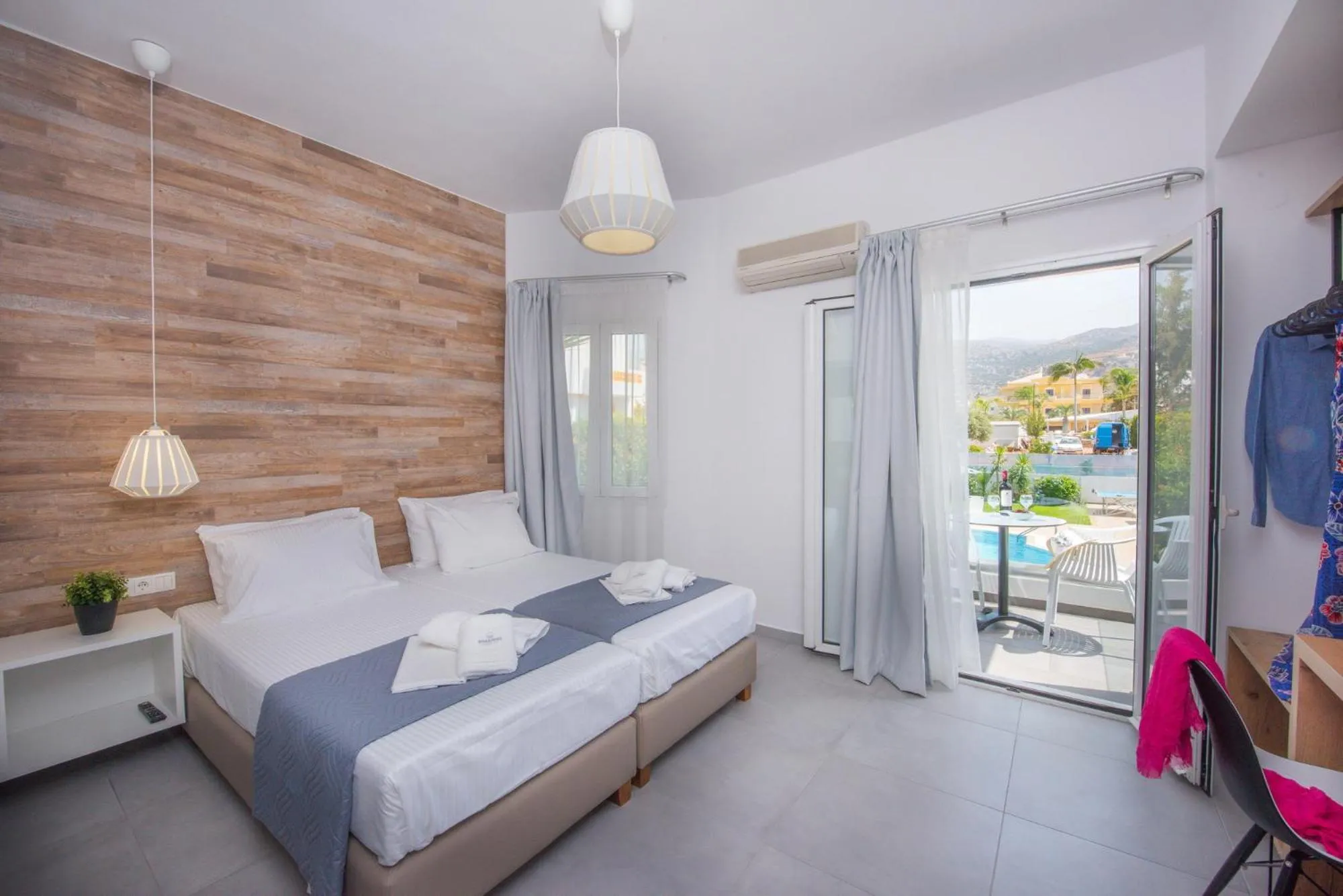 Photo of the whole room, Bed in Dimamiel Malia Inn