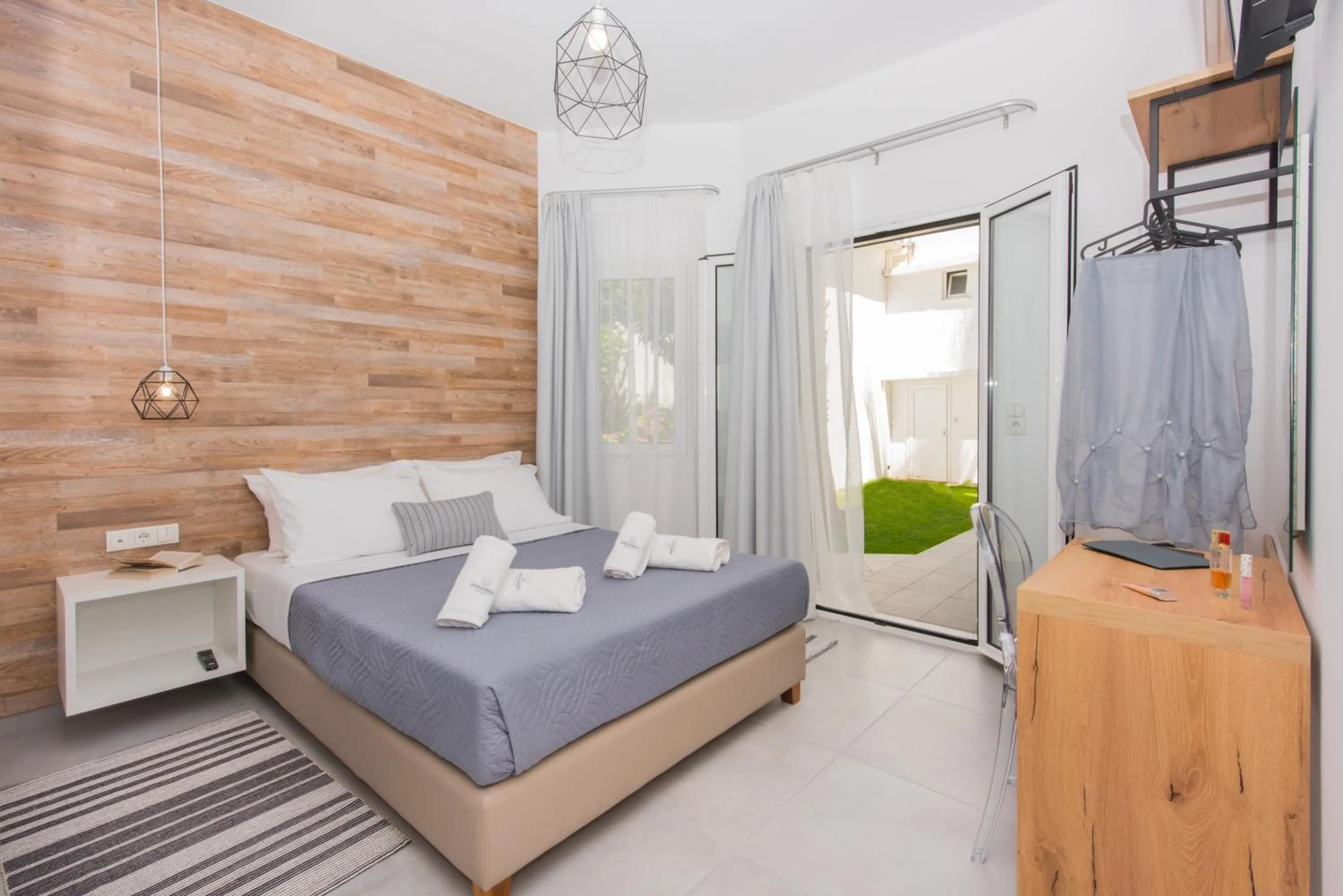 Photo of the whole room, Bed in Dimamiel Malia Inn