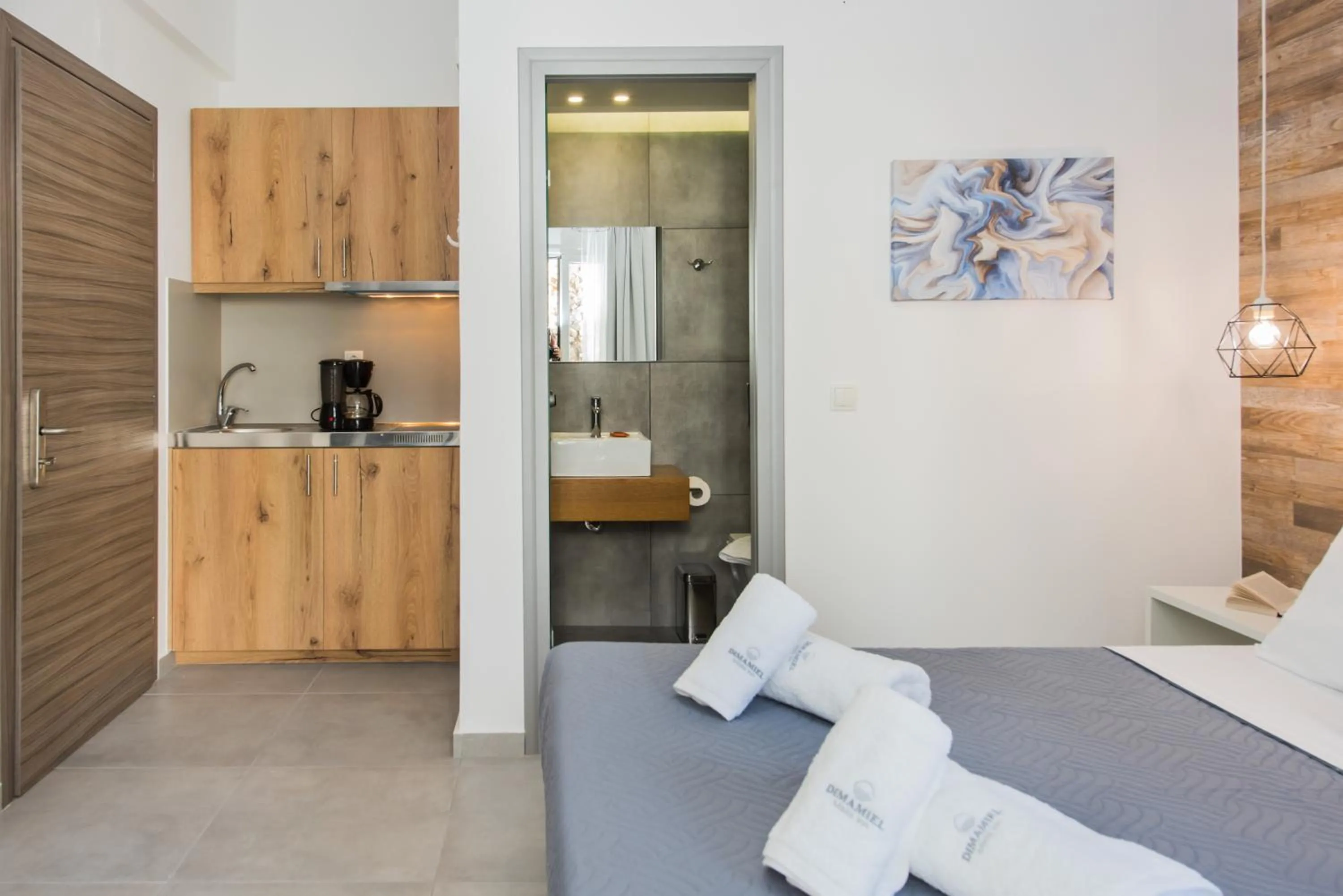 Kitchen or kitchenette, Bed in Dimamiel Malia Inn