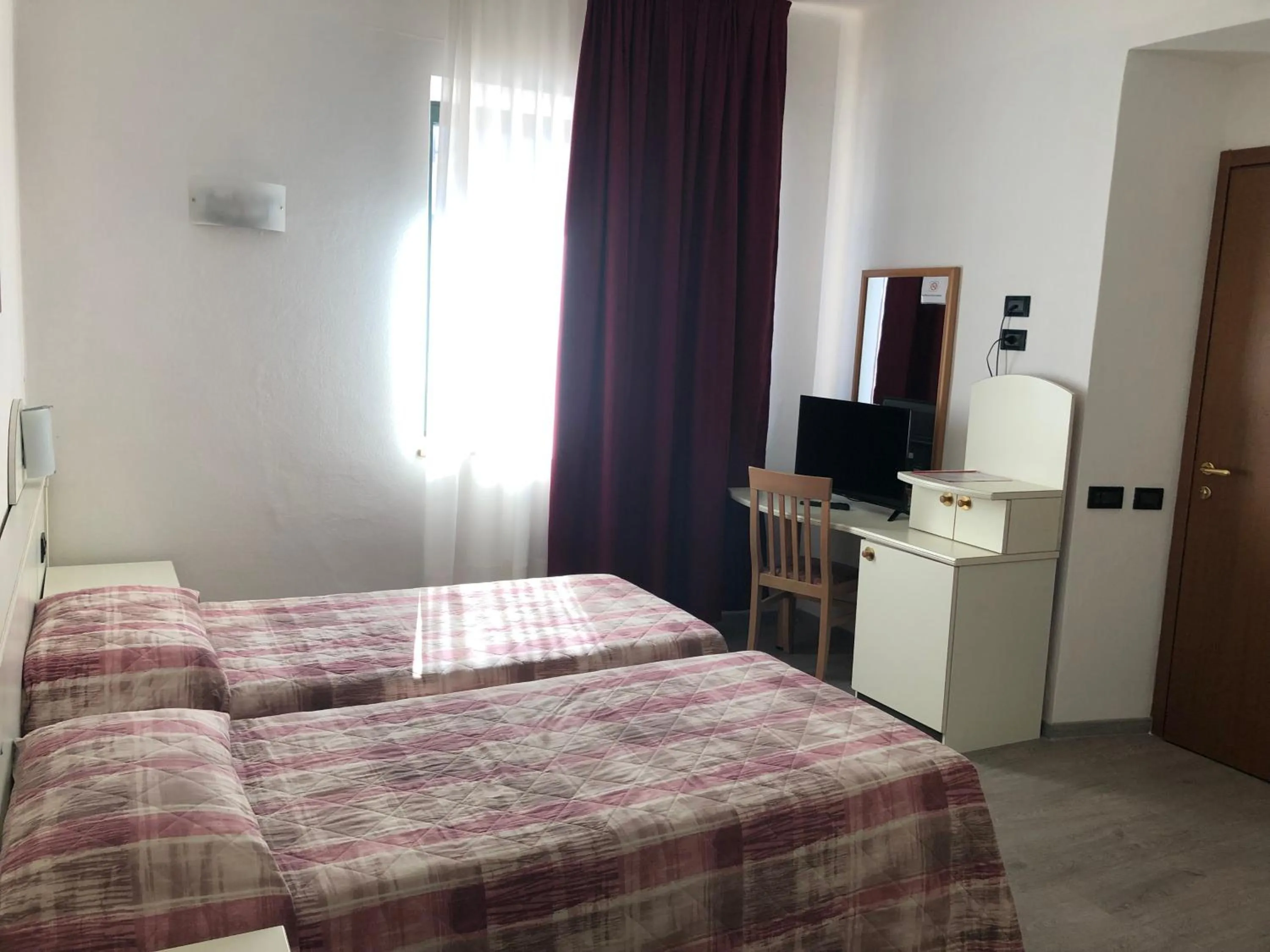 Bed in Hotel Alpi Del Mare