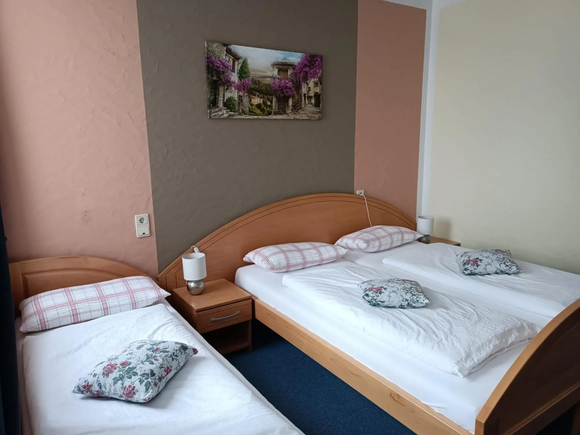 Bed in Garni Hotel Post