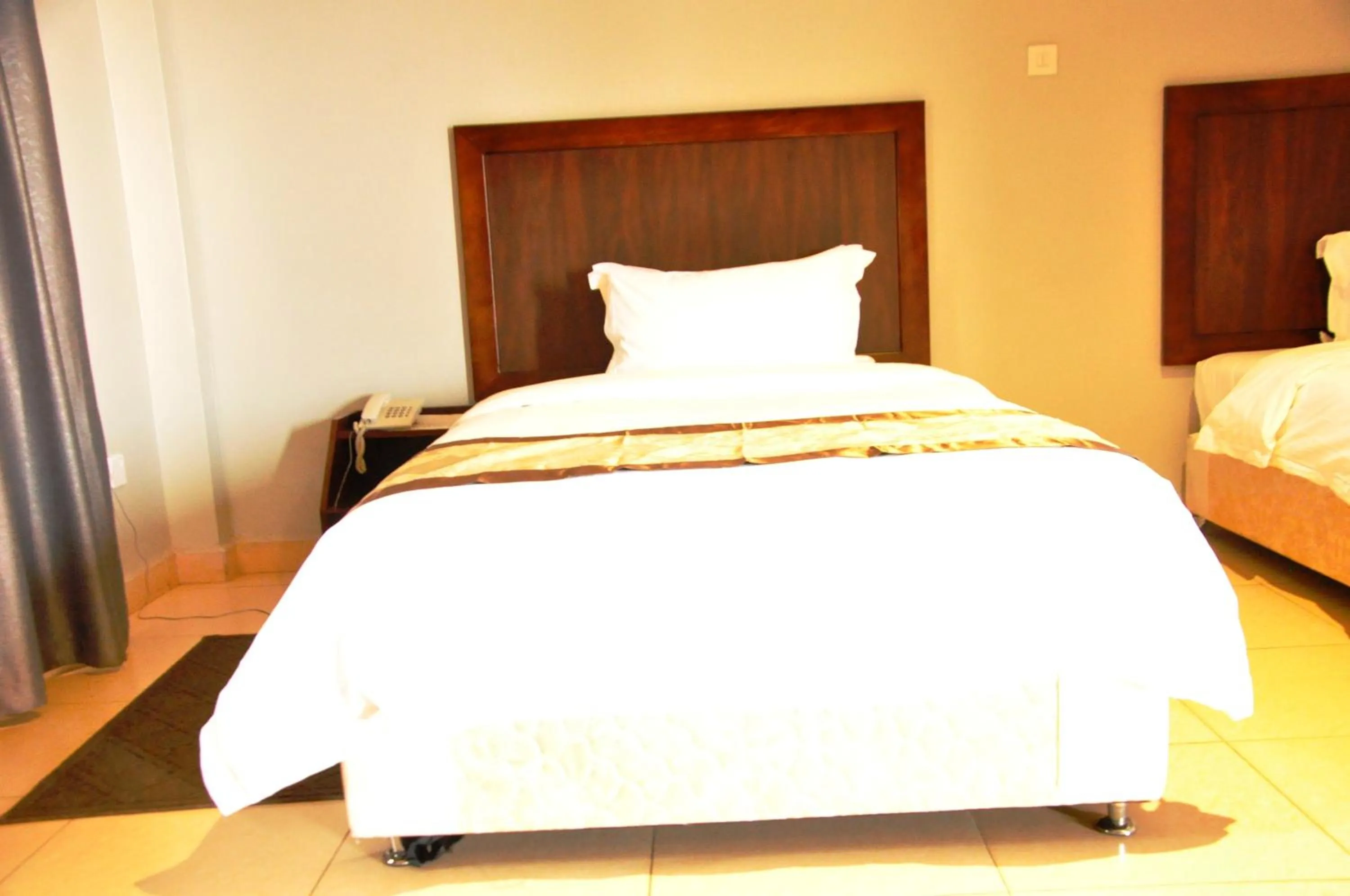 Bed in Easy View Hotel Mbarara