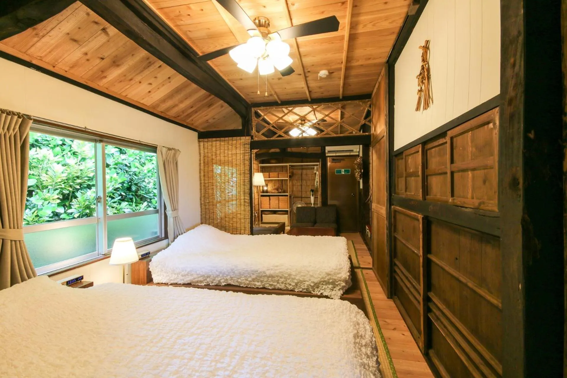 Living room, Bed in #Nerome01 Traditional Okinawan House in Ogimi, bc