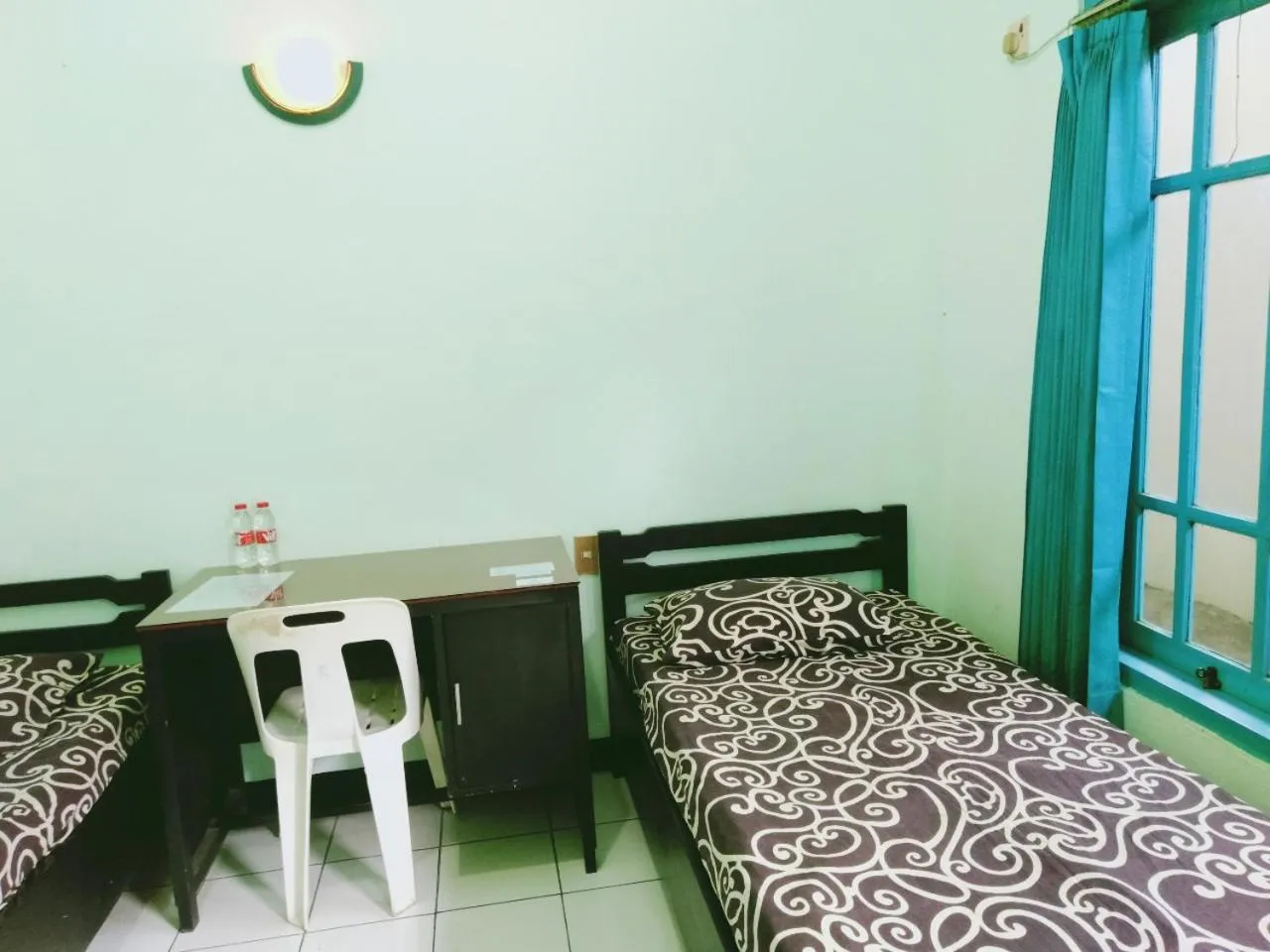 Bed in Hotel Taman Indah