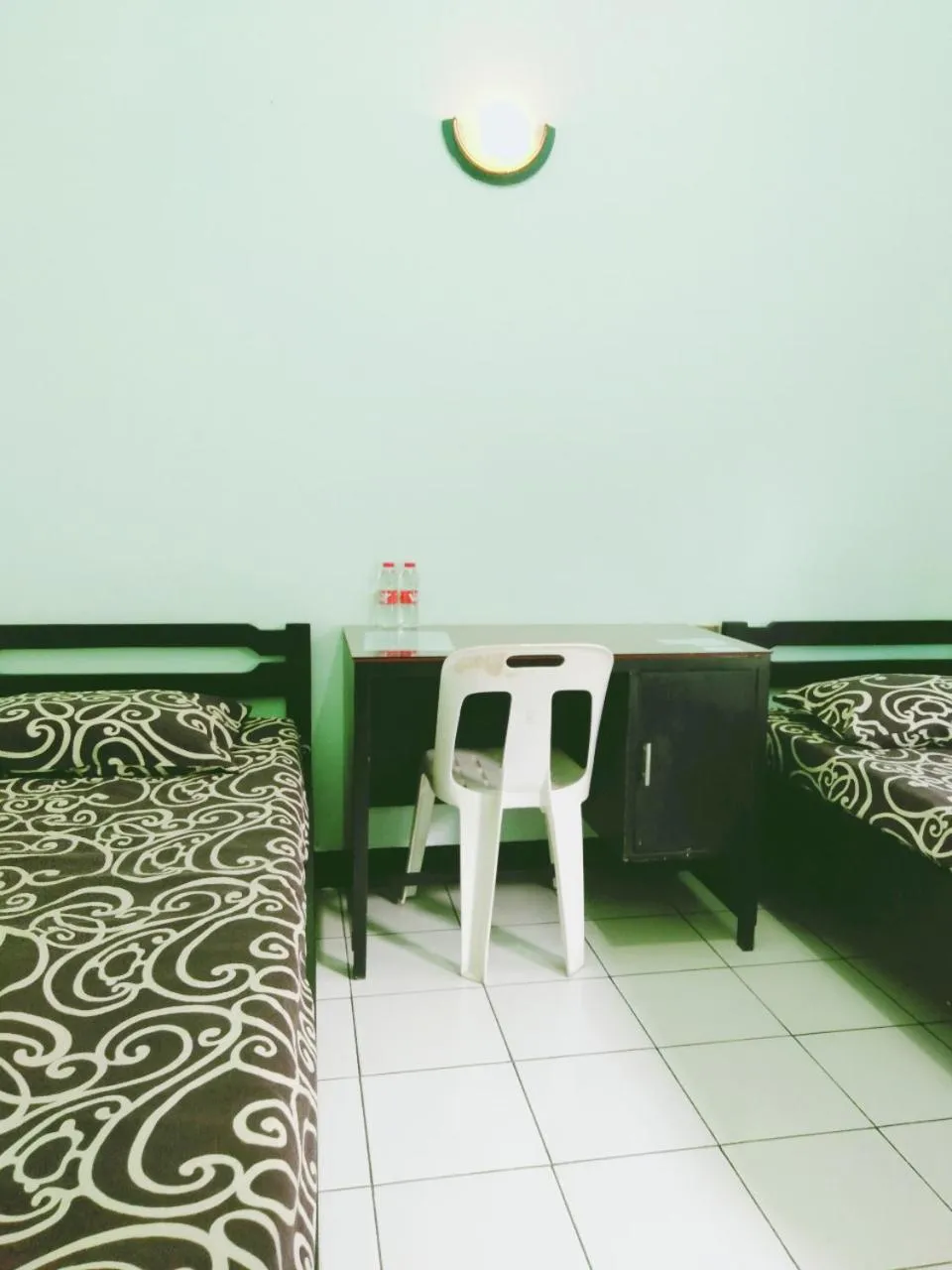 Living room, Bed in Hotel Taman Indah