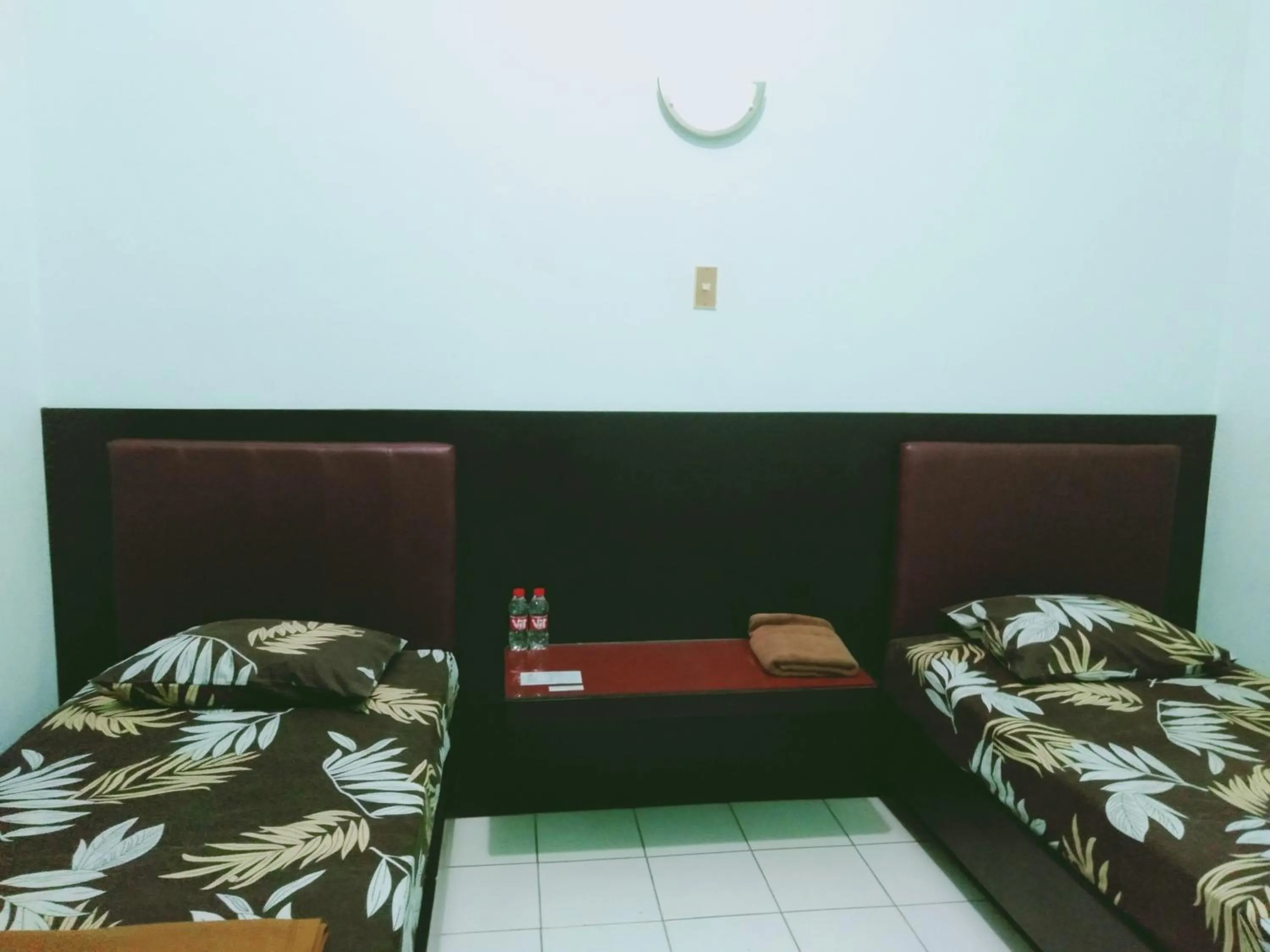 Bed in Hotel Taman Indah