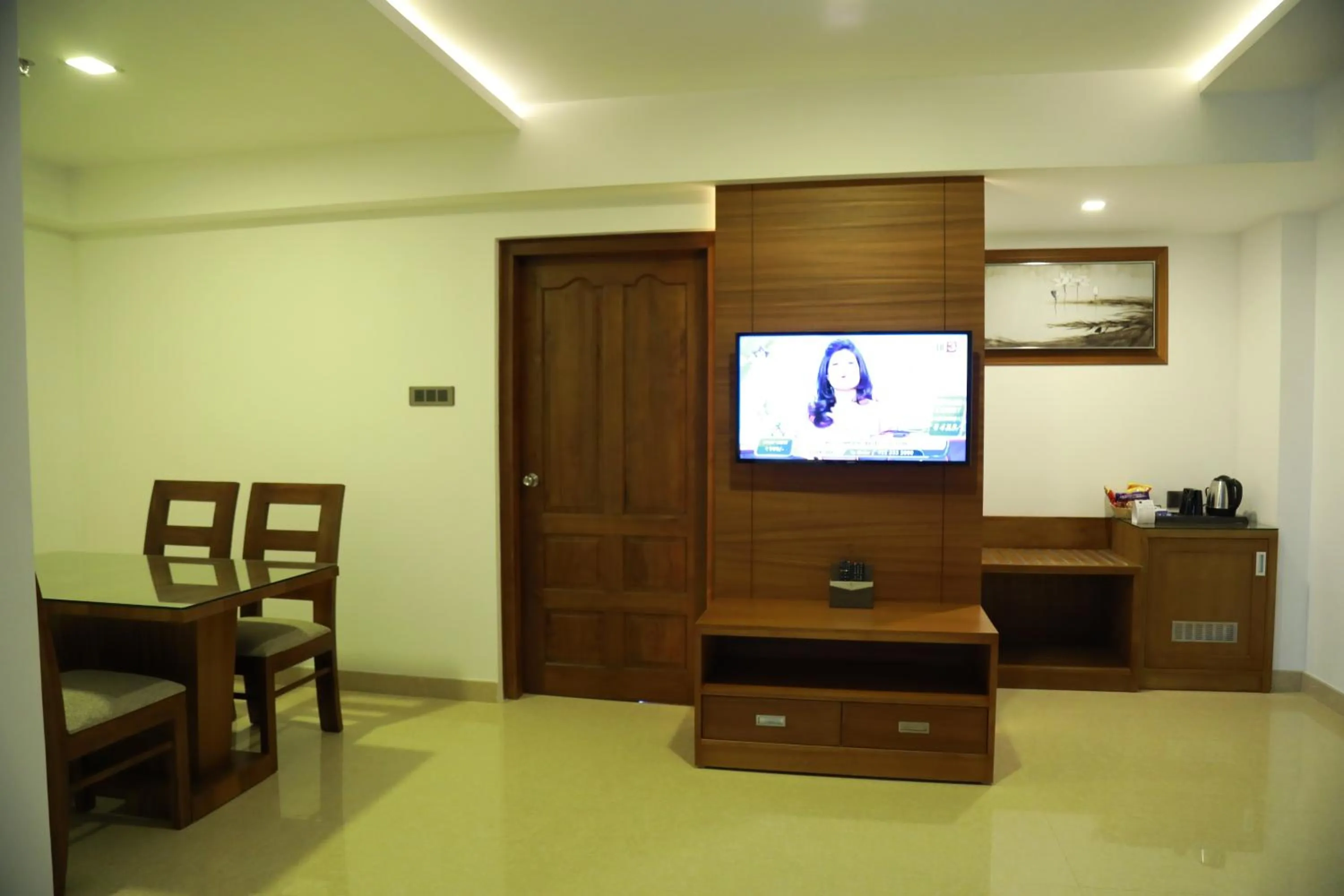 Communal lounge/ TV room in Hotel Karthika Park