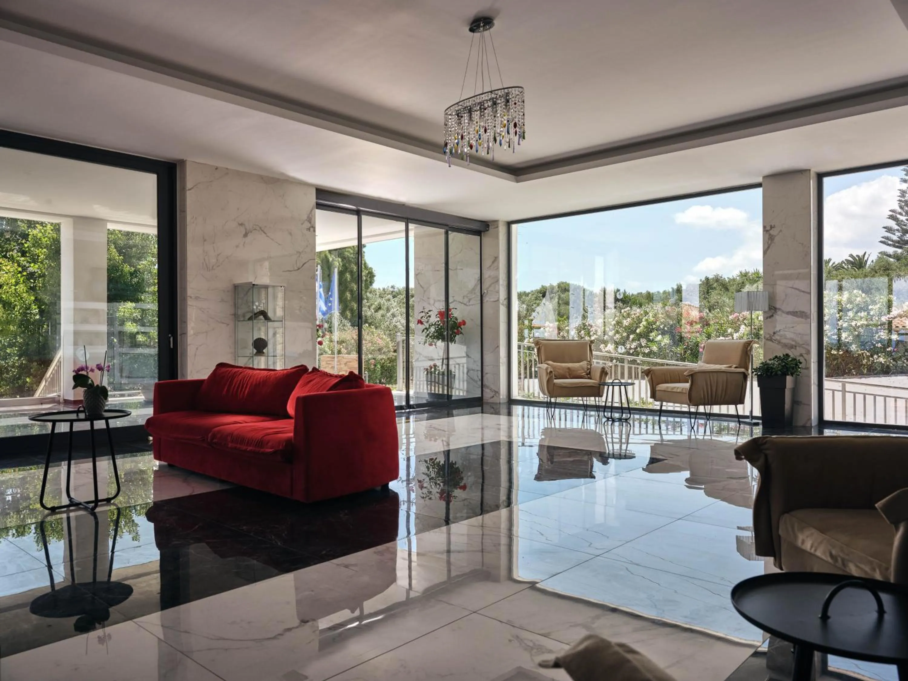 Communal lounge/ TV room in Cavo Orient Beach Hotel & Suites