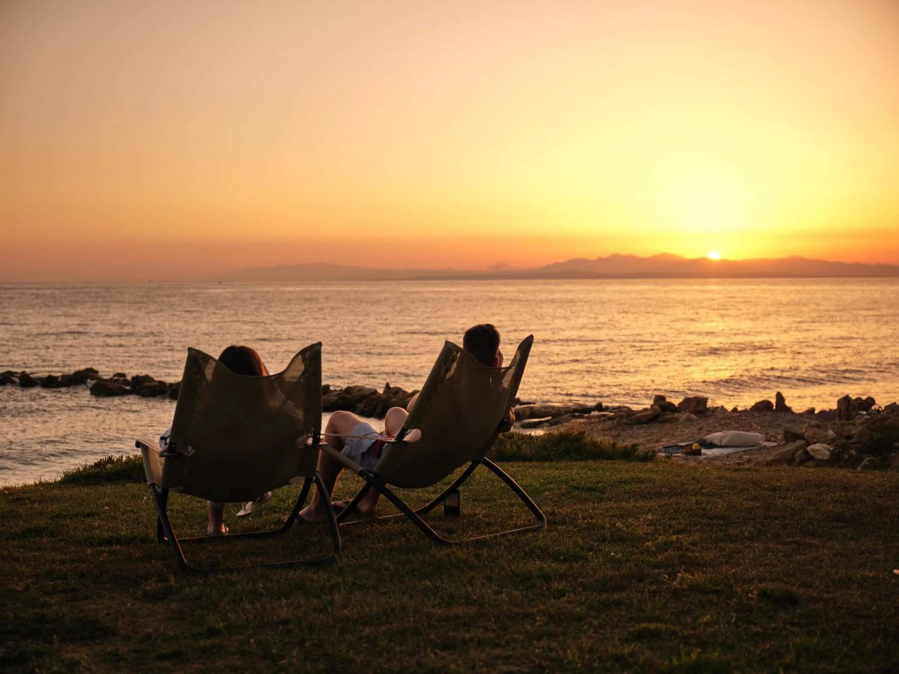 Sunset in Cavo Orient Beach Hotel & Suites