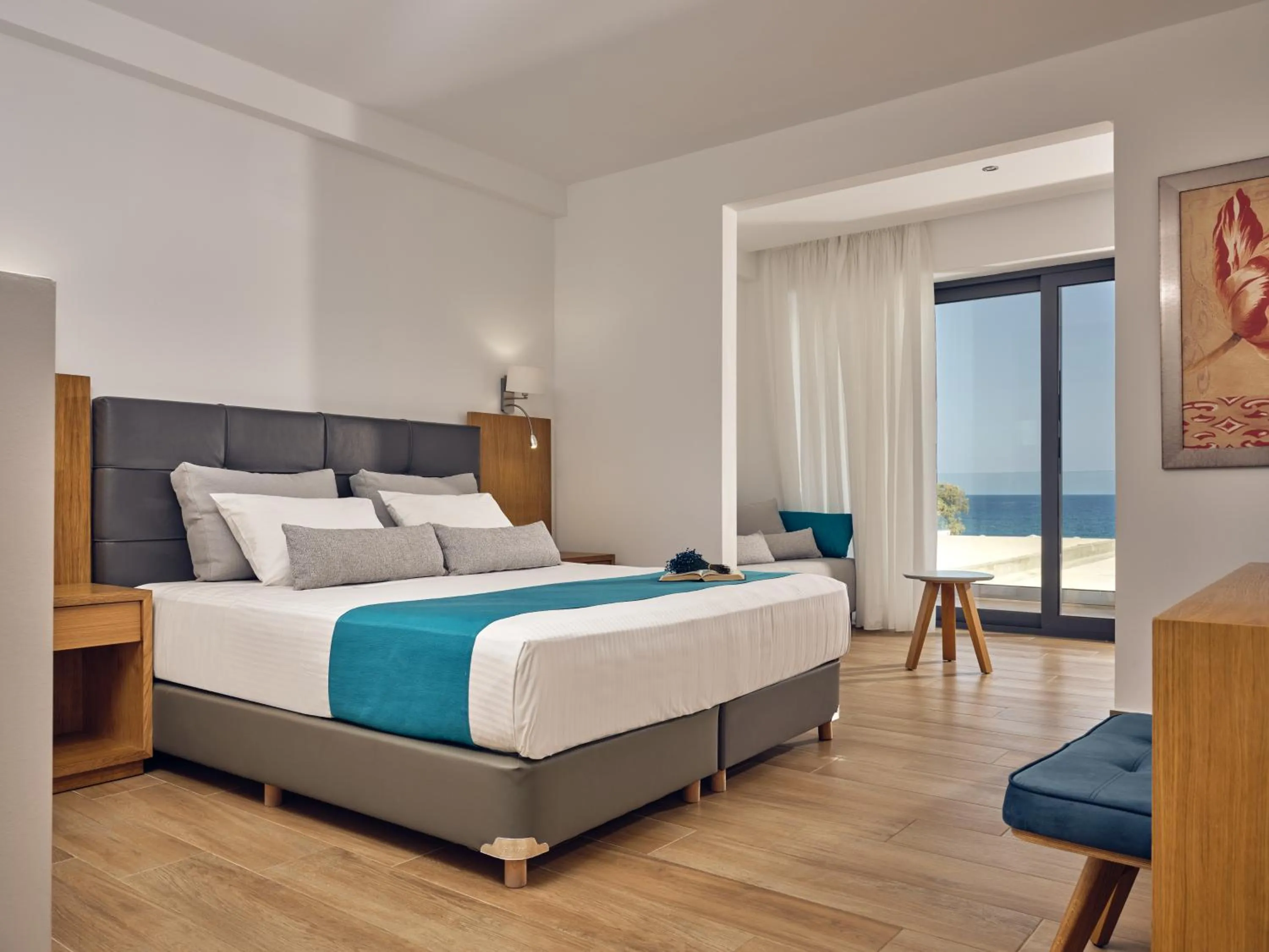 Bedroom, Bed in Cavo Orient Beach Hotel & Suites