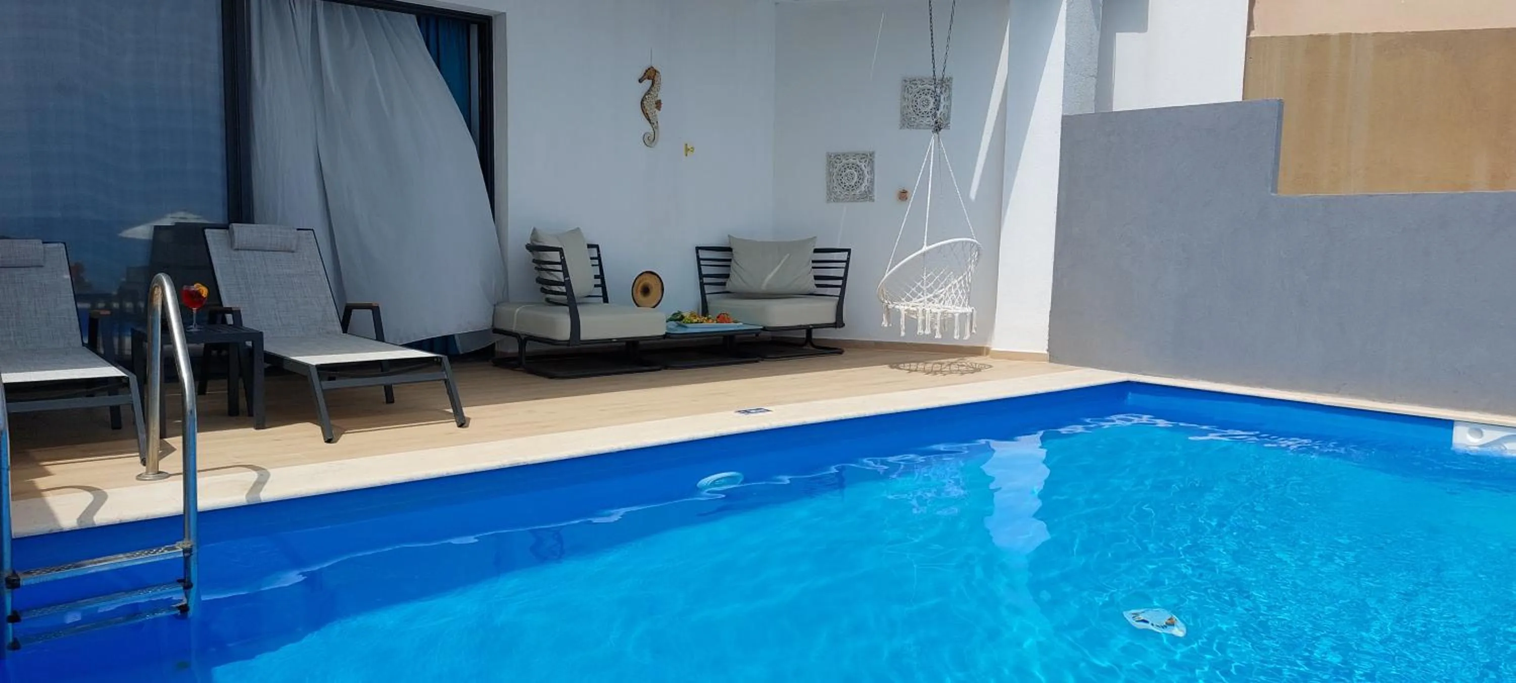 Swimming pool in Cavo Orient Beach Hotel & Suites