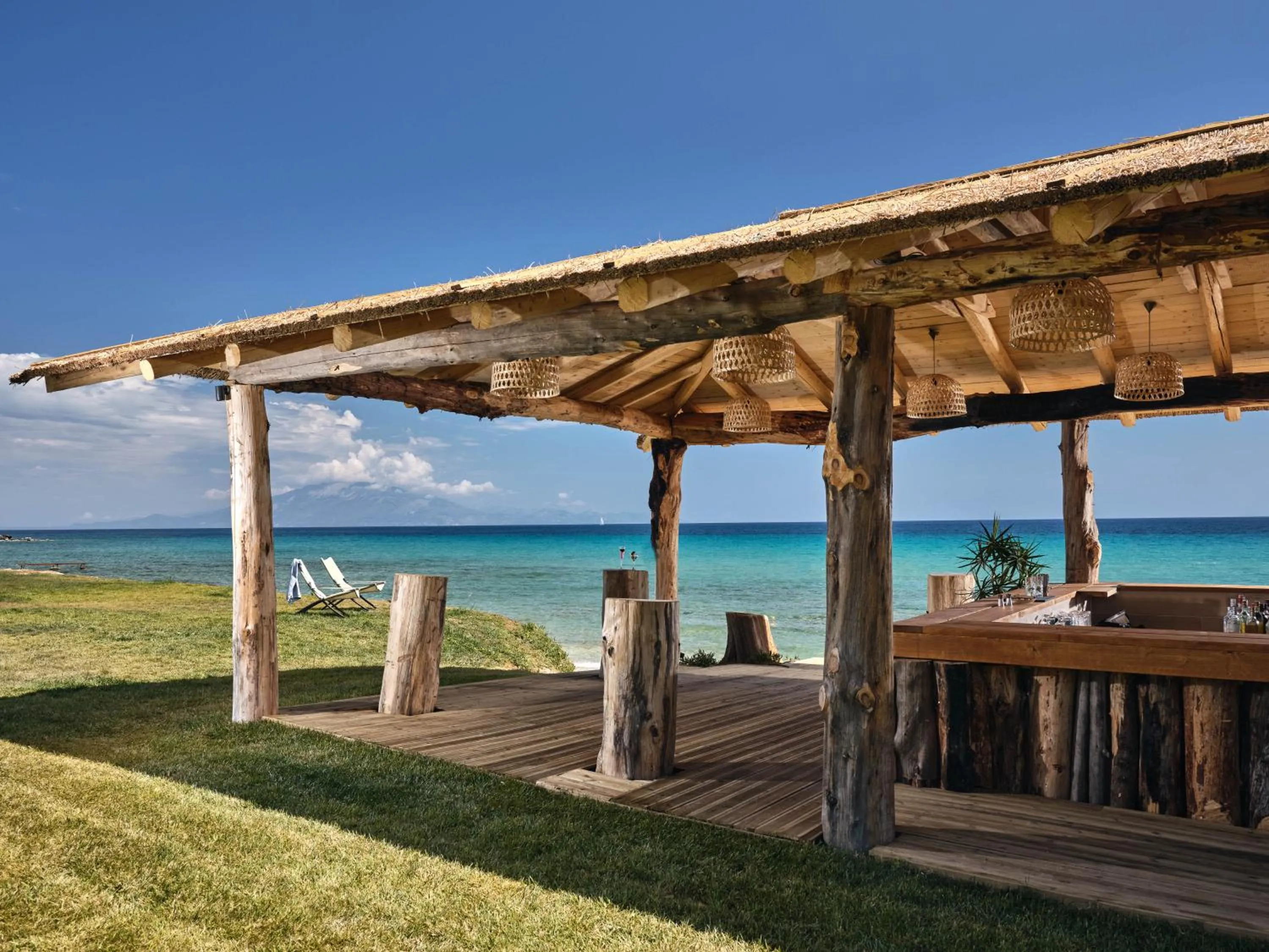 Lounge or bar in Cavo Orient Beach Hotel & Suites