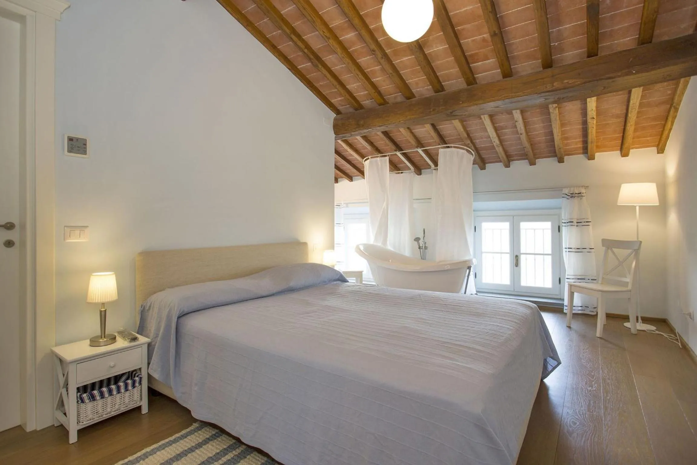 Bedroom, Bed in Santo Stefano 10 by Salogi Villas