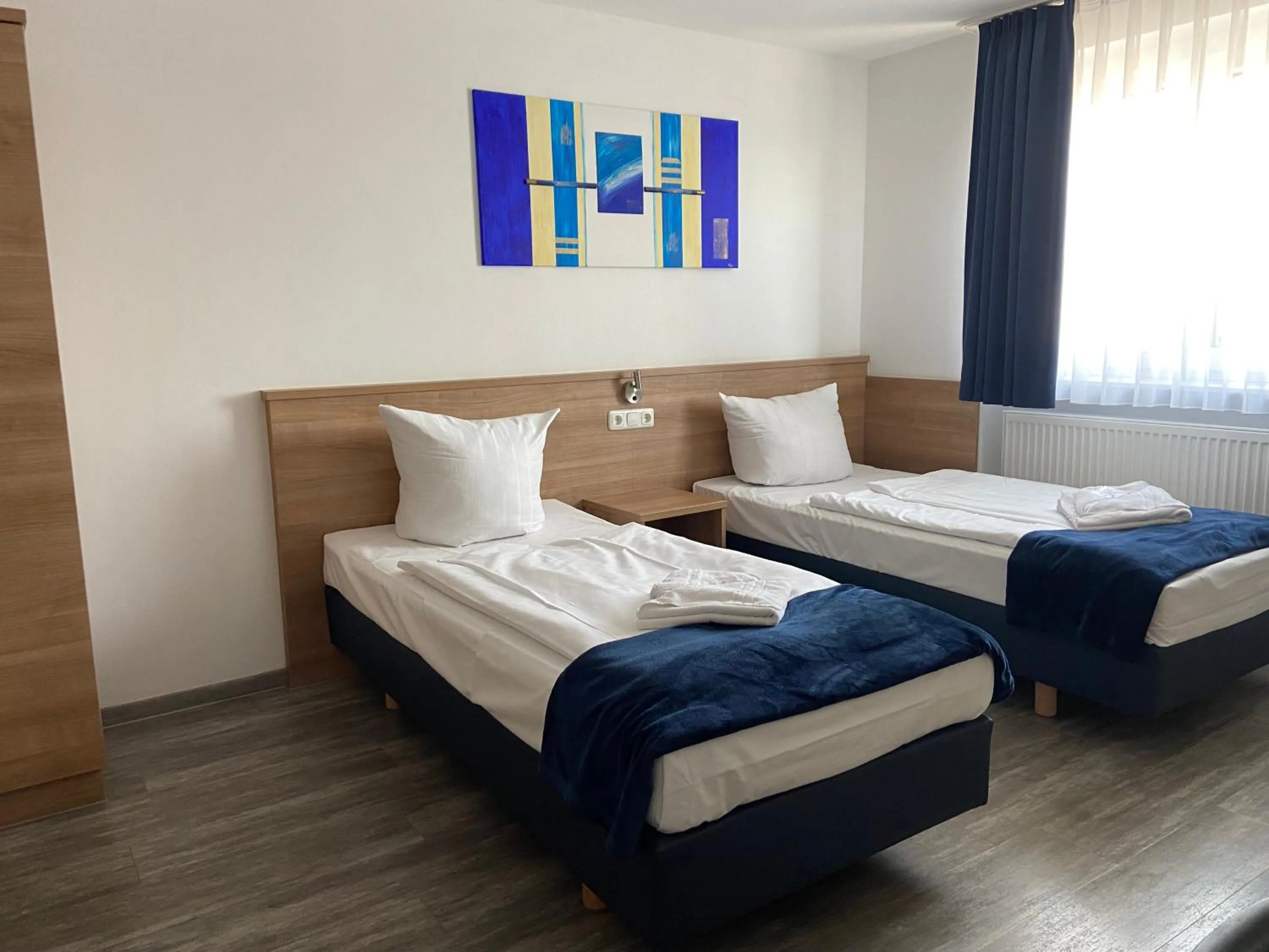 Bed in Sunny Hotel Straubing