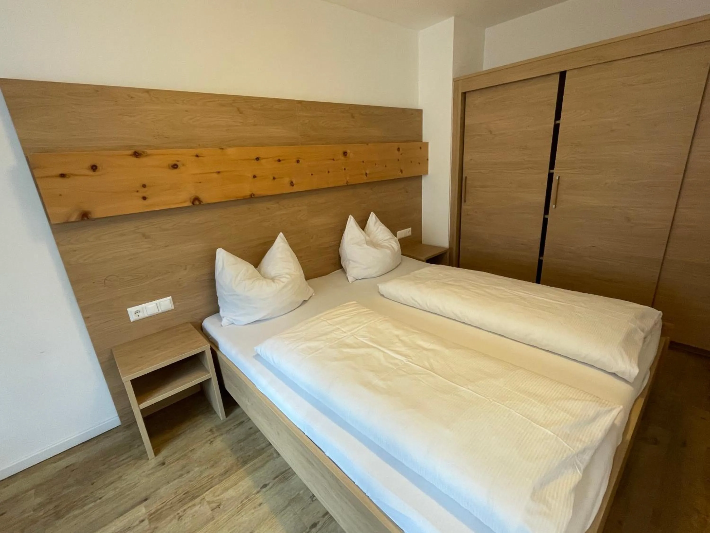 Bed in Pension Ahorn