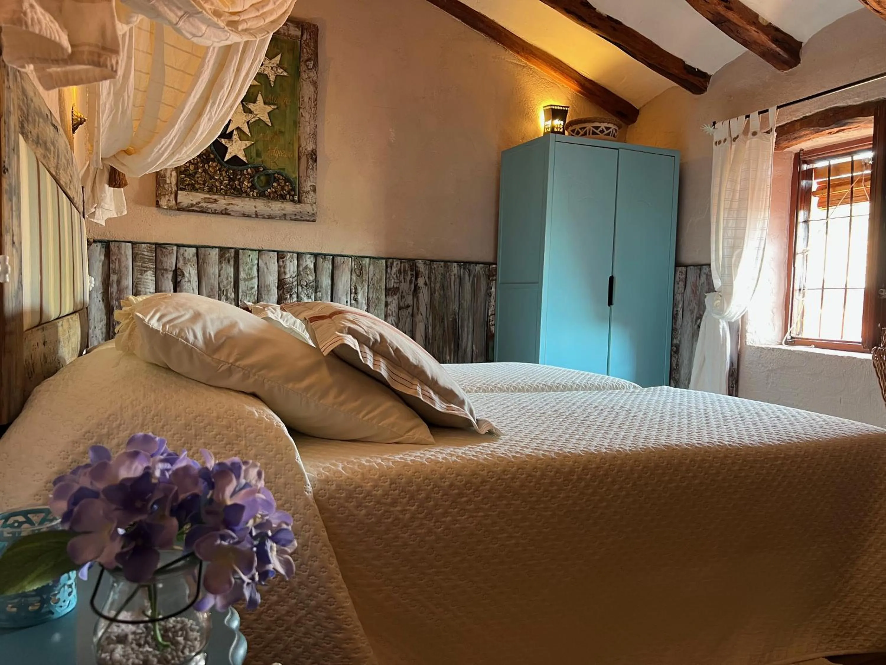 Bed in Les Vinyes Alojamiento Rural Boutique & SPA