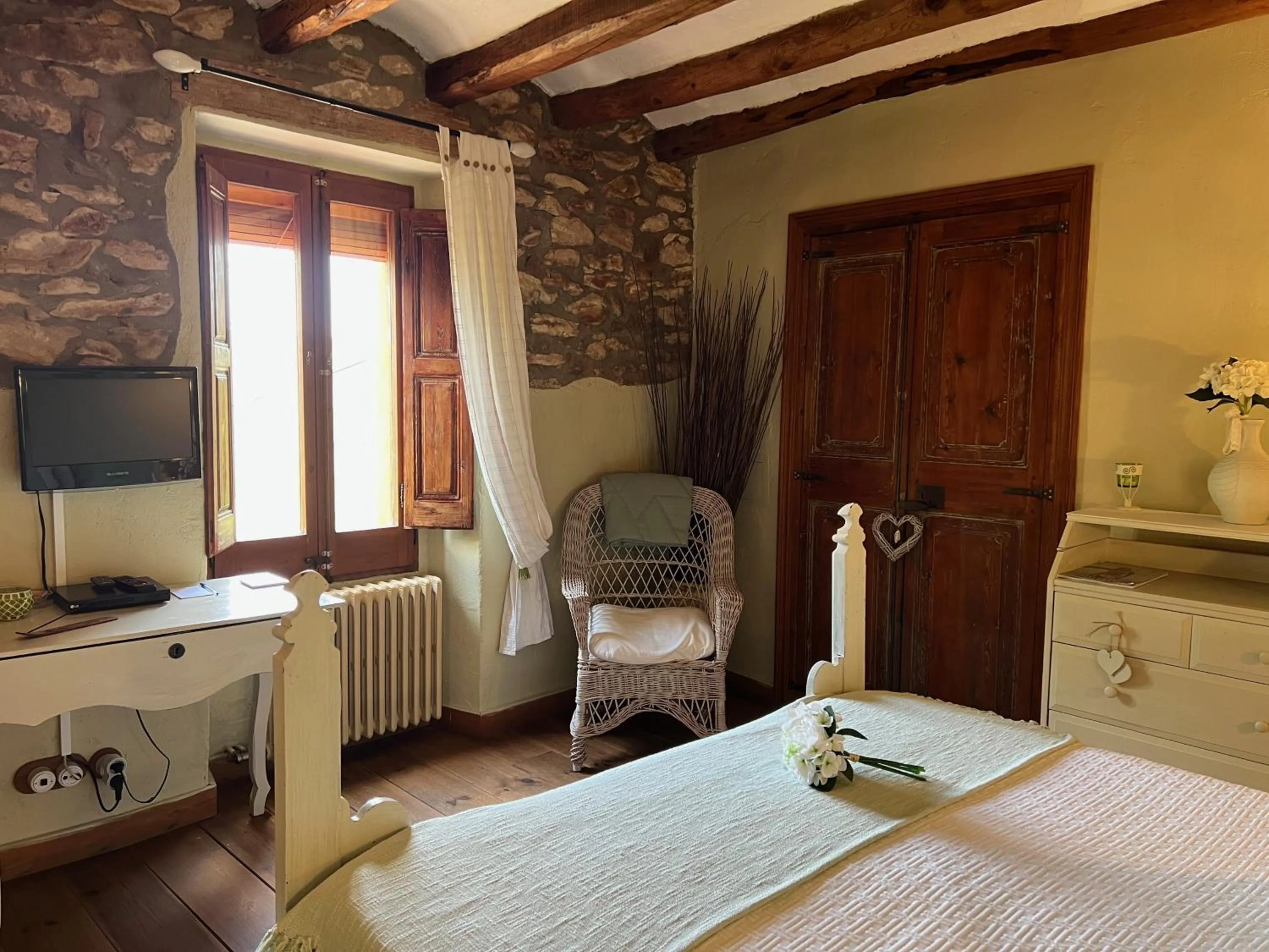 Bed in Les Vinyes Alojamiento Rural Boutique & SPA