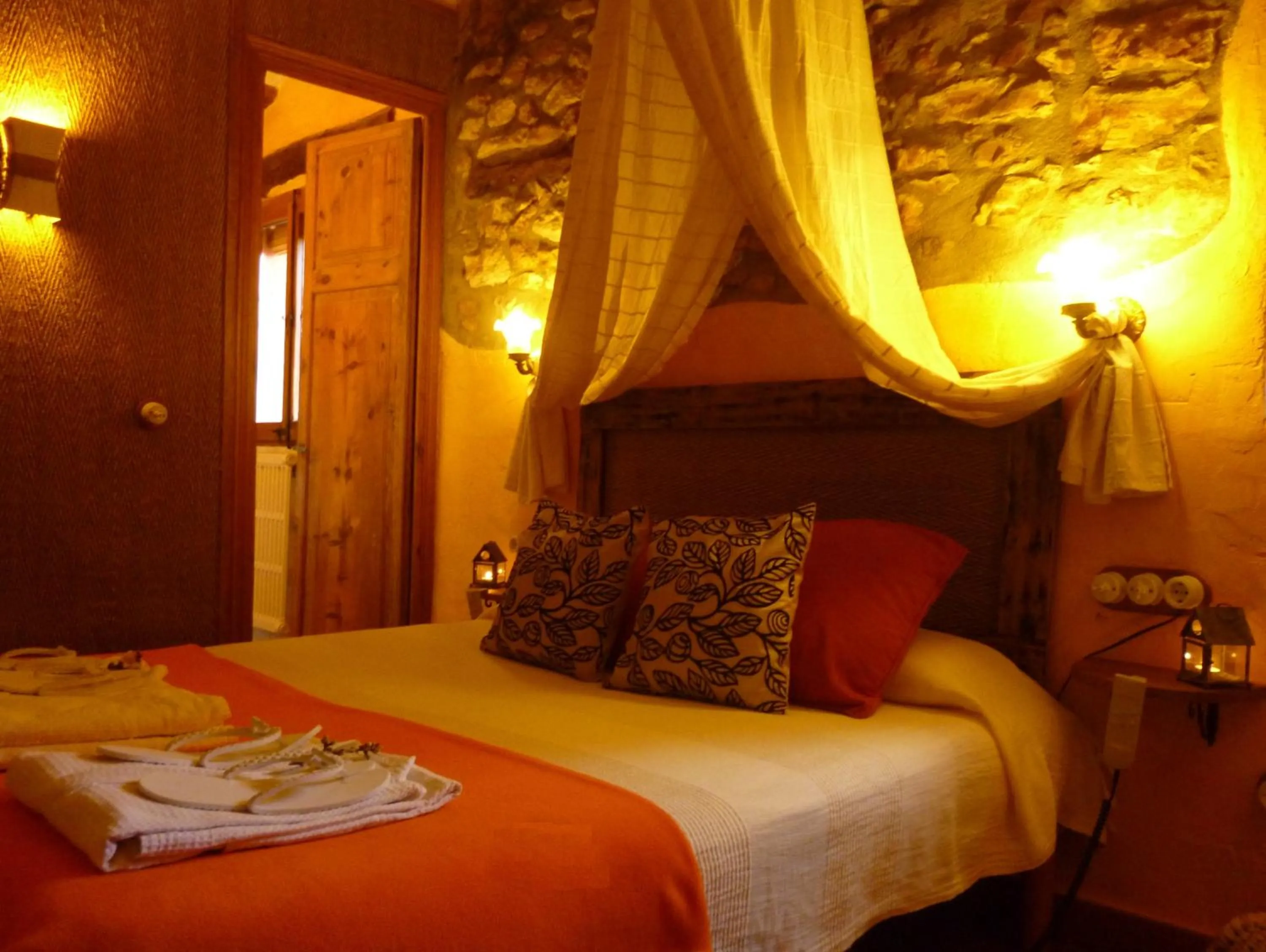 Bed in Les Vinyes Alojamiento Rural Boutique & SPA