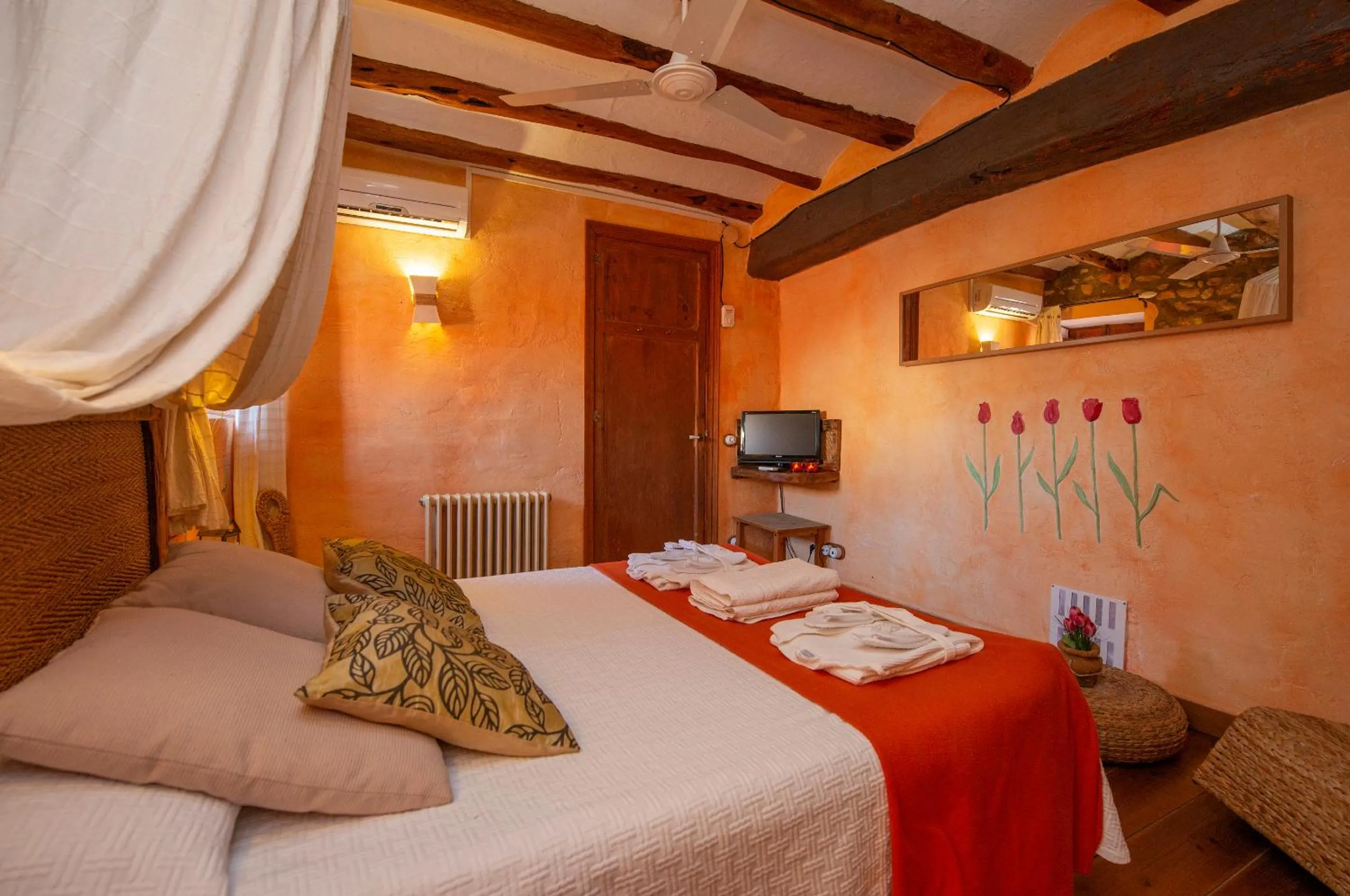 Bed in Les Vinyes Alojamiento Rural Boutique & SPA