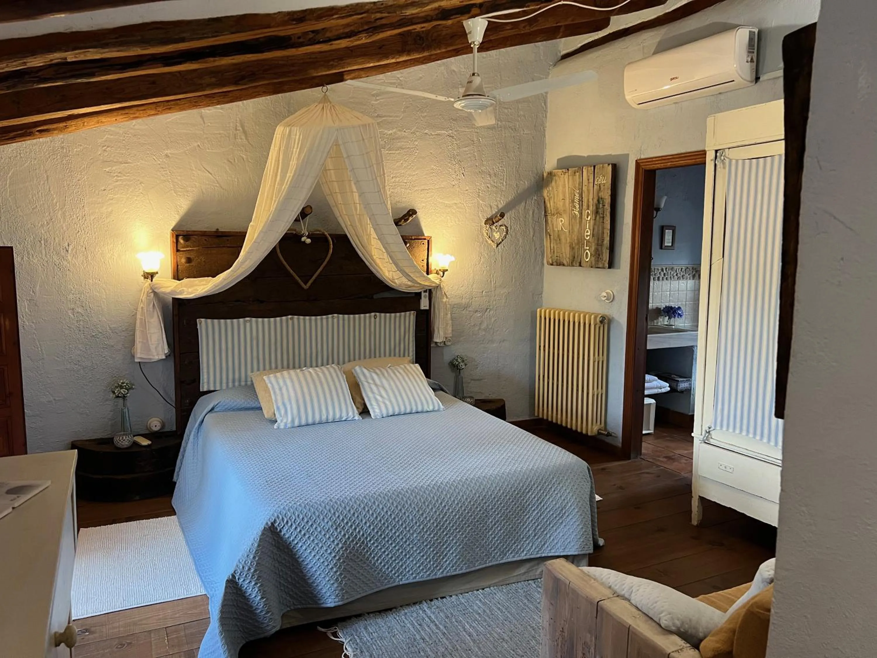 Bed in Les Vinyes Alojamiento Rural Boutique & SPA